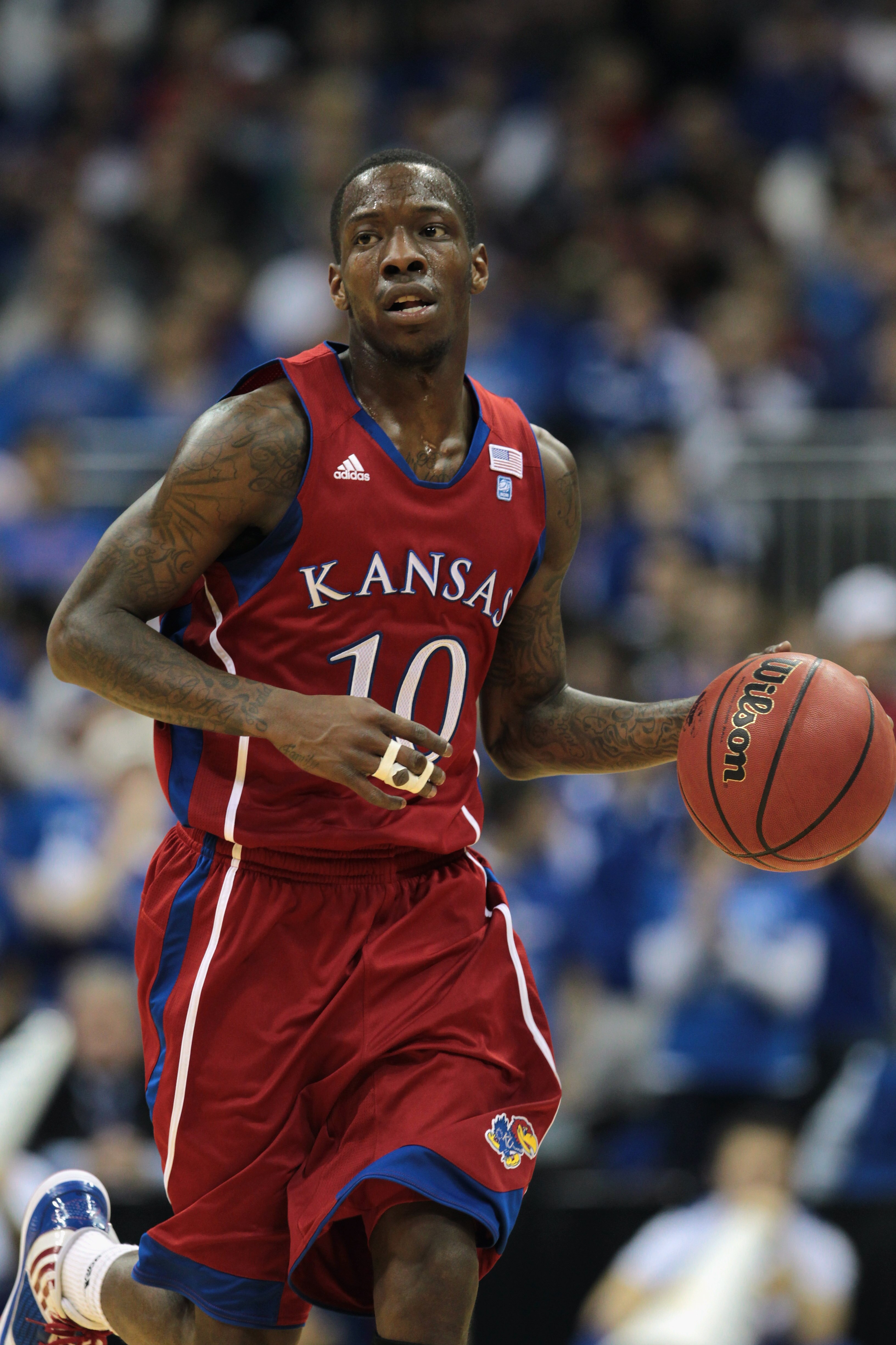 KANSAS CITY, MO - DECEMBER 11:  Tyshawn Taylor #10 of the Kansas Jayhawks in action during the game against the Colorado State Rams on December 11, 2010 at the Sprint Center in Kansas City, Missouri.  (Photo by Jamie Squire/Getty Images)