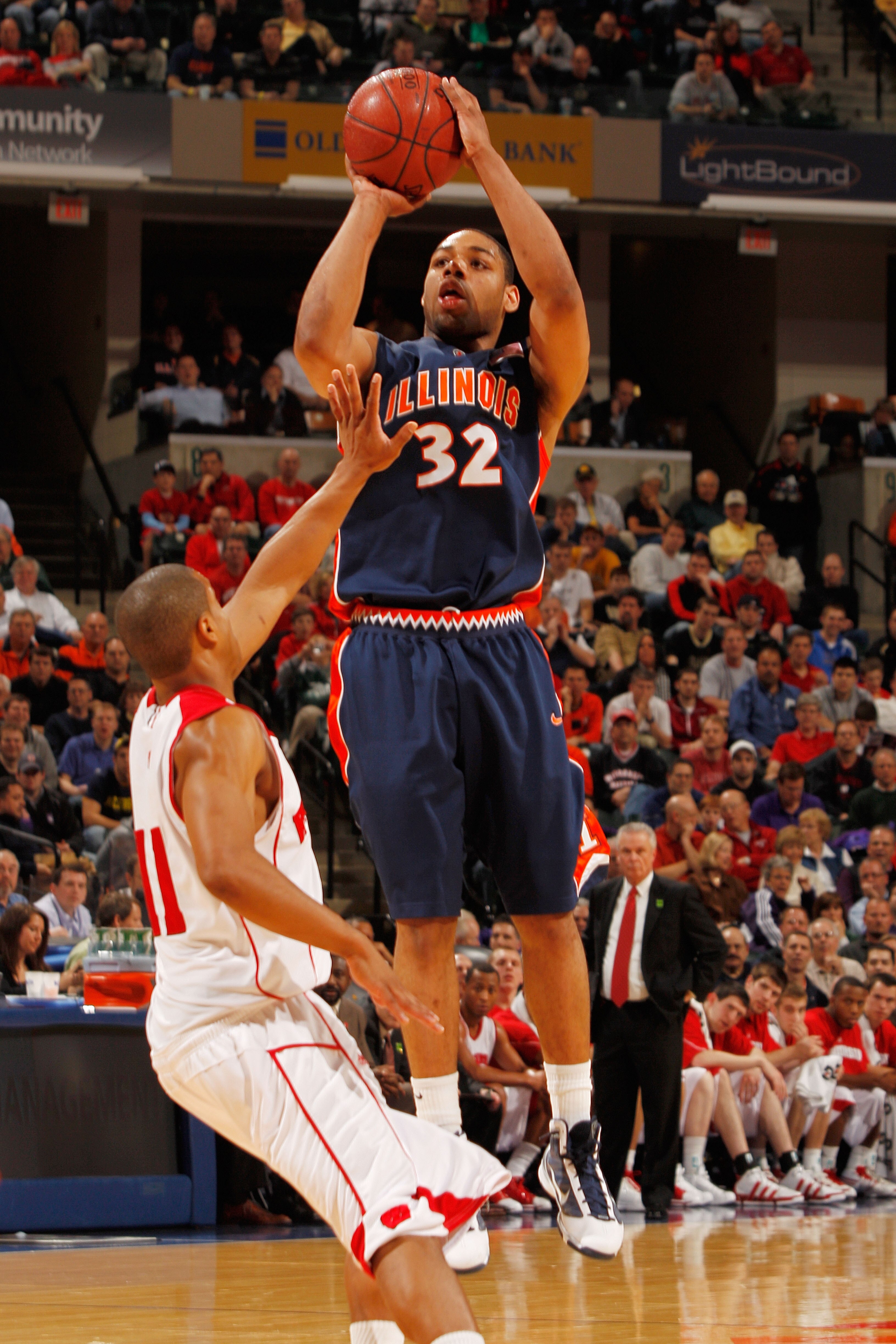 INDIANAPOLIS - MARCH 12:  Guard Demetri McCamey #32 of the Illinois Fighting Illini attempts a shot against the Wisconsin Badgers during the quarterfinals of the Big Ten Men's Basketball Tournament at Conseco Fieldhouse on March 12, 2010 in Indianapolis, 
