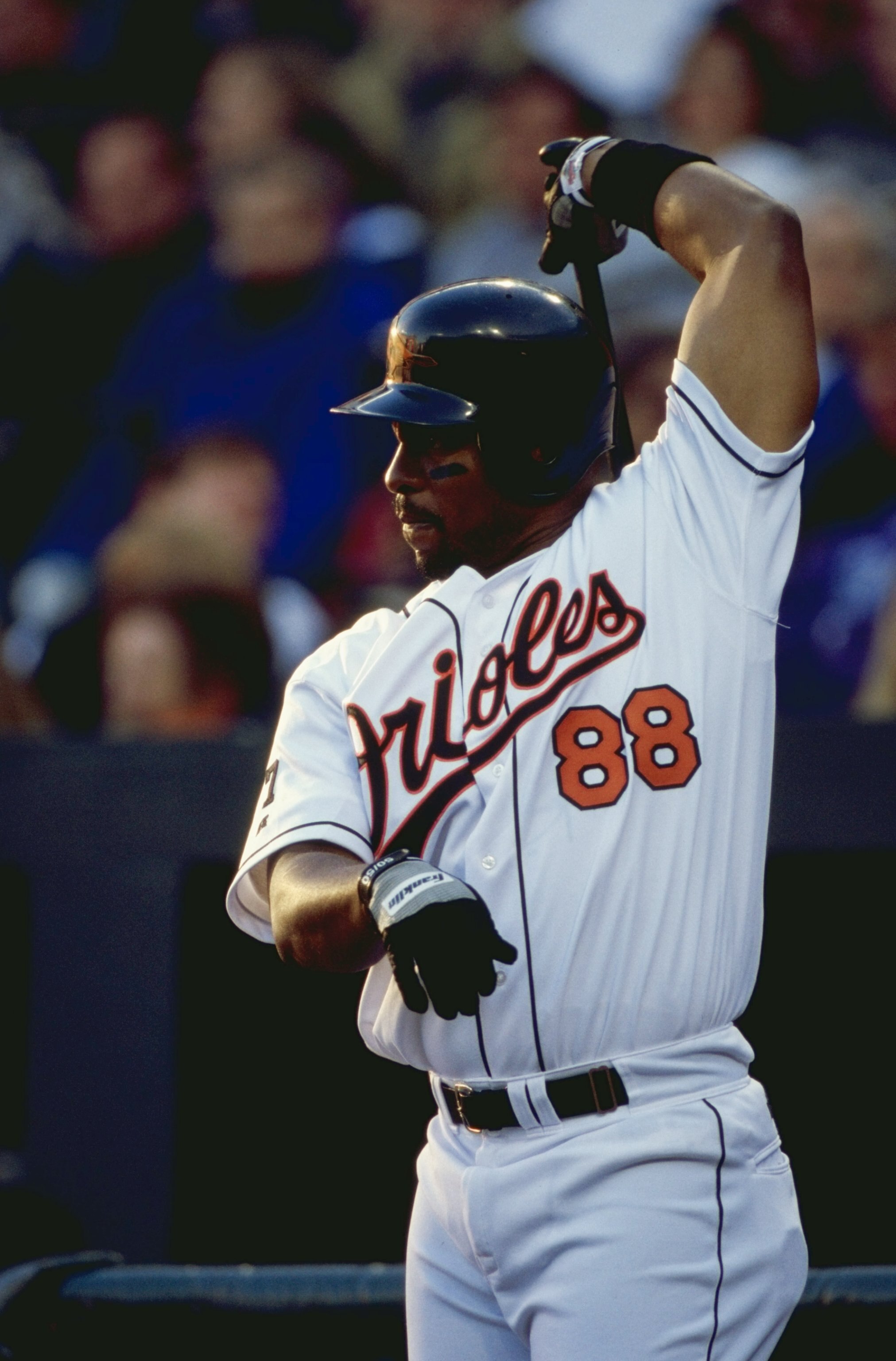 5 Apr 1999: Albert Belle #88 of the Baltimore Orioles stretches his arm as he gets ready to bat during the Opening Day game against the Tampa Bay Devil Rays in Orioles Park at the Camden Yards in Baltimore, Maryland. The Orioles defeated the Devil Rays 10