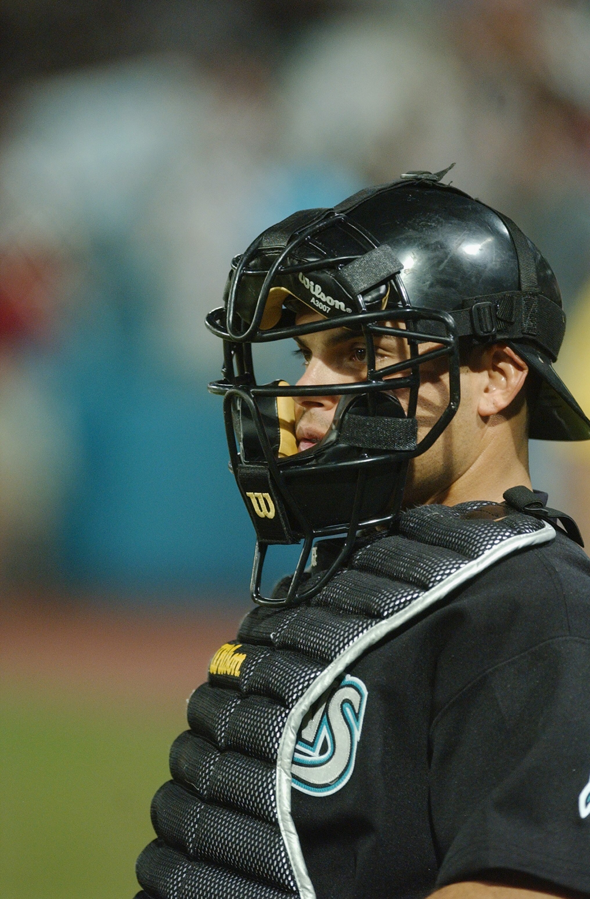 MIAMI - OCTOBER 23:  Ivan Rodriguez #7 of the Florida Marlins looks on from behind home plate against the New York Yankees during game five of the Major League Baseball World Series on October 23, 2003 at Pro Player Stadium in Miami, Florida.  The Marlins