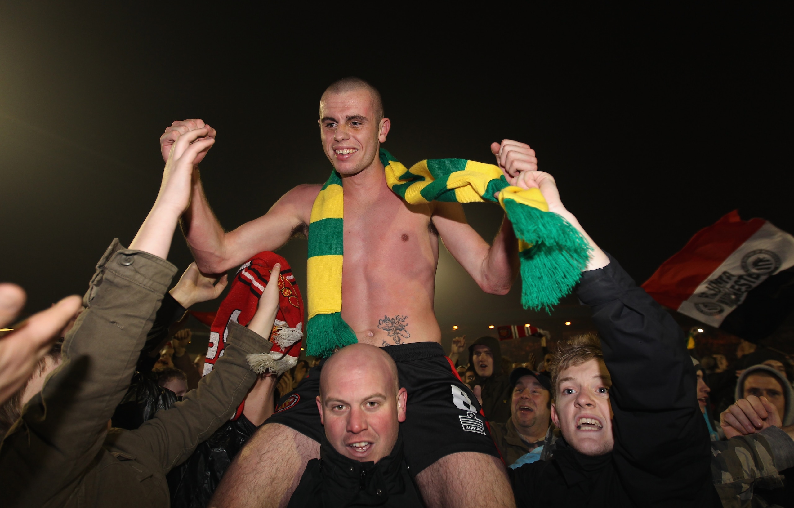 ROCHDALE, ENGLAND - NOVEMBER 05: Scott McManus of FC United of Manchester is mobbed by supporters after victory over Rochdale in the FA Cup 1st Round match sponsored by e-on at Spotland Stadium on November 5, 2010 in Rochdale, England. (Photo by Alex Li ROCHDALE, ENGLAND - NOVEMBER 05: Scott McManus of FC United of Manchester is mobbed by supporters after victory over Rochdale in the FA Cup 1st Round match sponsored by e-on at Spotland Stadium on November 5, 2010 in Rochdale, England. (Photo by Alex Li
