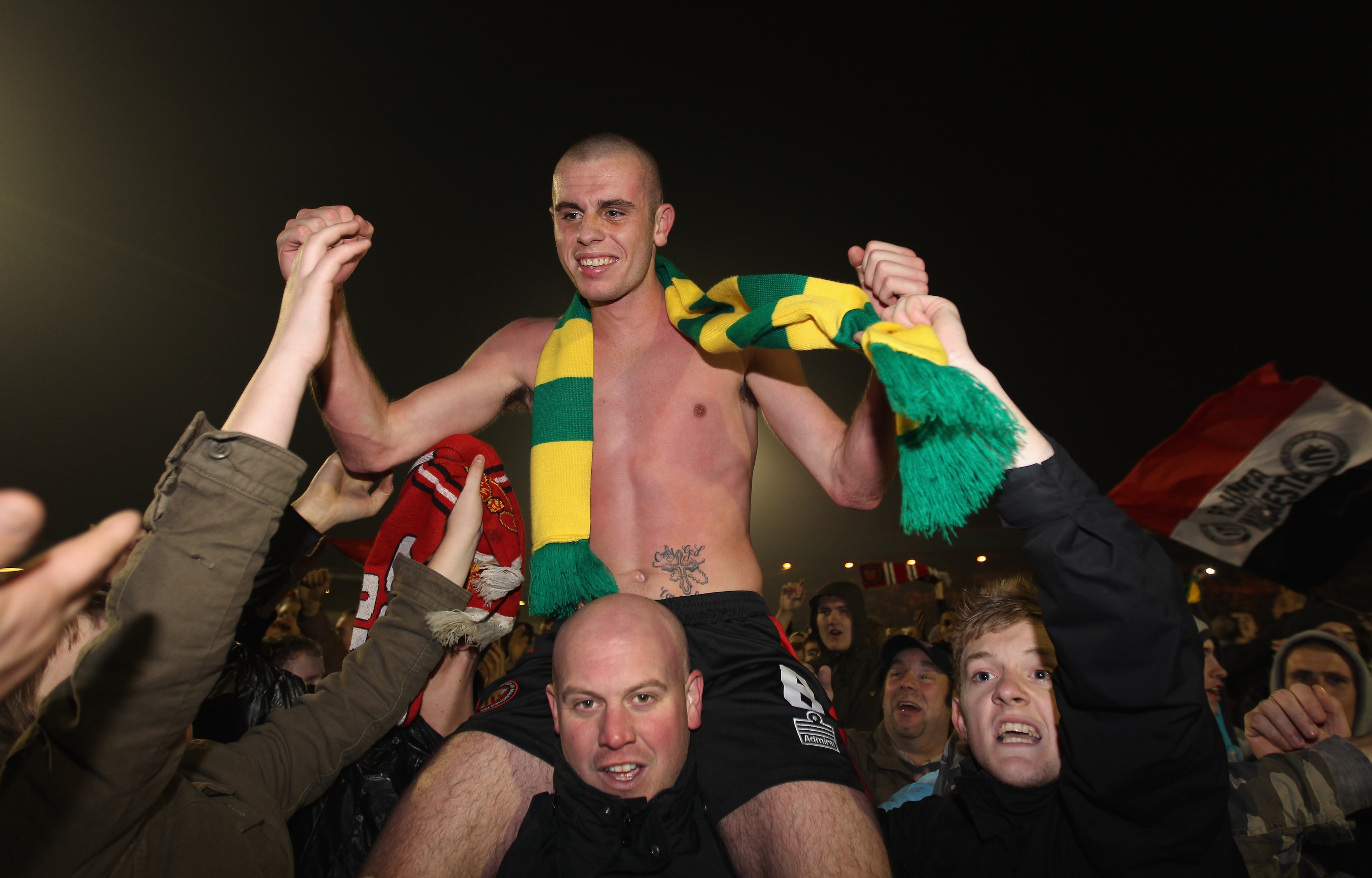 ROCHDALE, ENGLAND - NOVEMBER 05: Scott McManus of FC United of Manchester is mobbed by supporters after victory over Rochdale in the FA Cup 1st Round match sponsored by e-on at Spotland Stadium on November 5, 2010 in Rochdale, England. (Photo by Alex Li ROCHDALE, ENGLAND - NOVEMBER 05: Scott McManus of FC United of Manchester is mobbed by supporters after victory over Rochdale in the FA Cup 1st Round match sponsored by e-on at Spotland Stadium on November 5, 2010 in Rochdale, England. (Photo by Alex Li