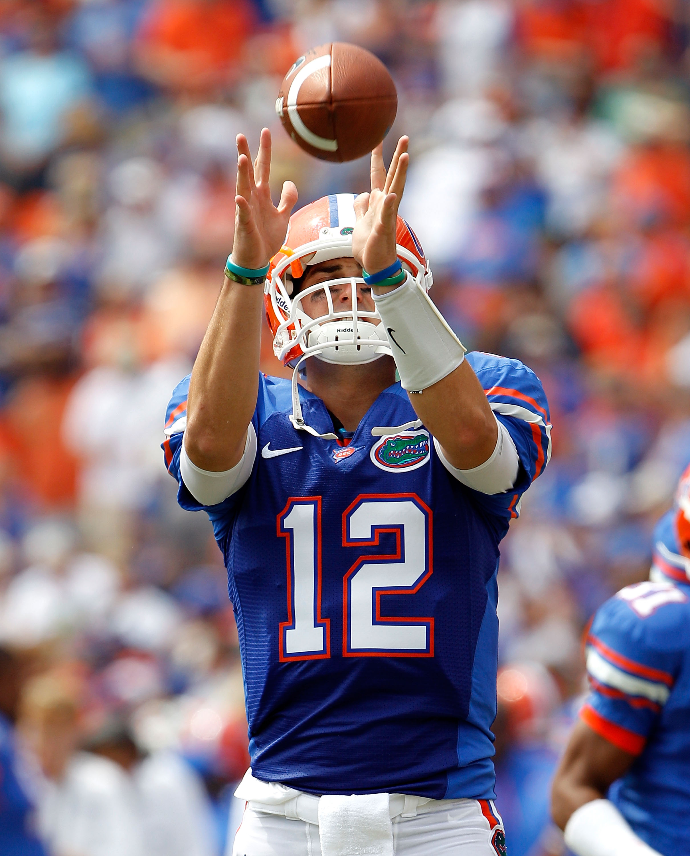 GAINESVILLE, FL - SEPTEMBER 04:  Quarterback John Brantley #12 of the Florida Gators catches a pass prior to the game against the Miami University RedHawks at Ben Hill Griffin Stadium on September 4, 2010 in Gainesville, Florida.  (Photo by Sam Greenwood/