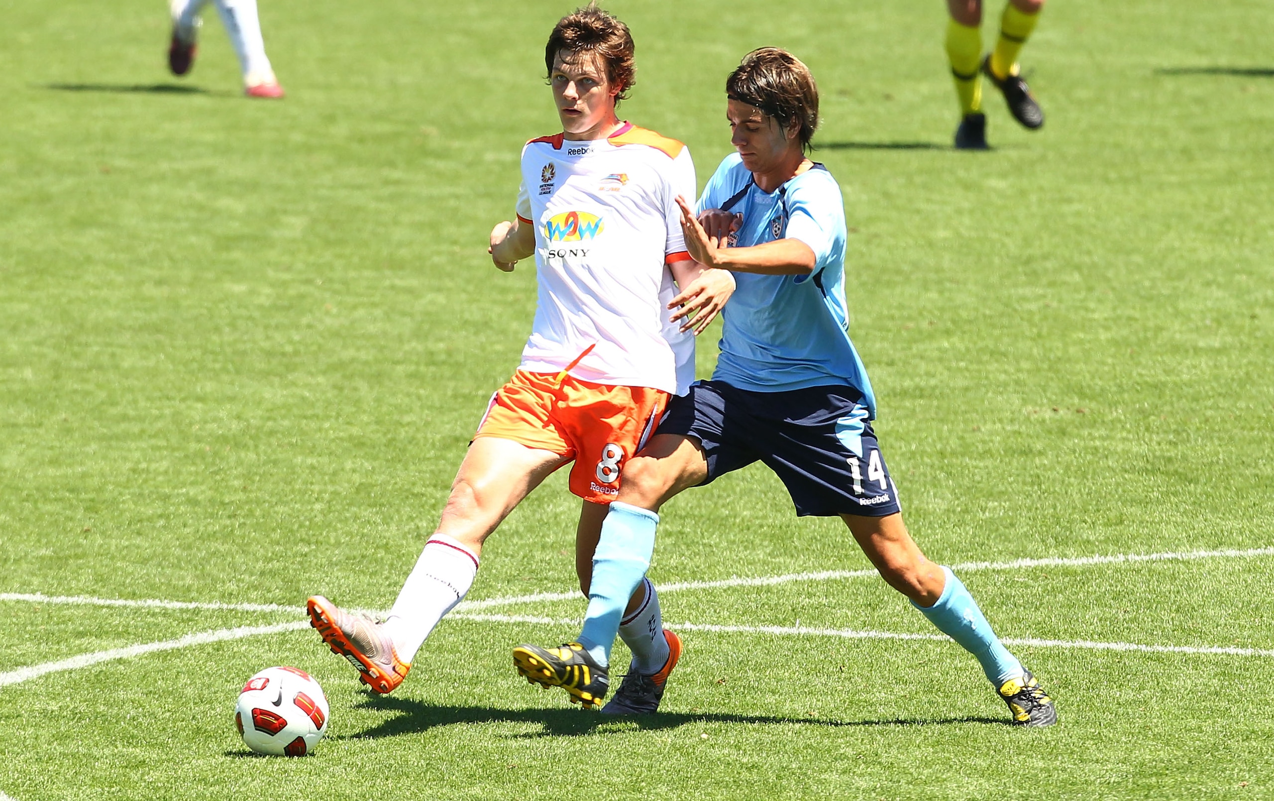 WOLLONGONG, AUSTRALIA - DECEMBER 11: James Donachie of the Roar and Peter Simonski of Sydney contest possession during the round 13 Youth League match between Sydney FC and the Brisbane Roar at WIN Stadium on December 11, 2010 in Wollongong, Australia. ( WOLLONGONG, AUSTRALIA - DECEMBER 11: James Donachie of the Roar and Peter Simonski of Sydney contest possession during the round 13 Youth League match between Sydney FC and the Brisbane Roar at WIN Stadium on December 11, 2010 in Wollongong, Australia. (