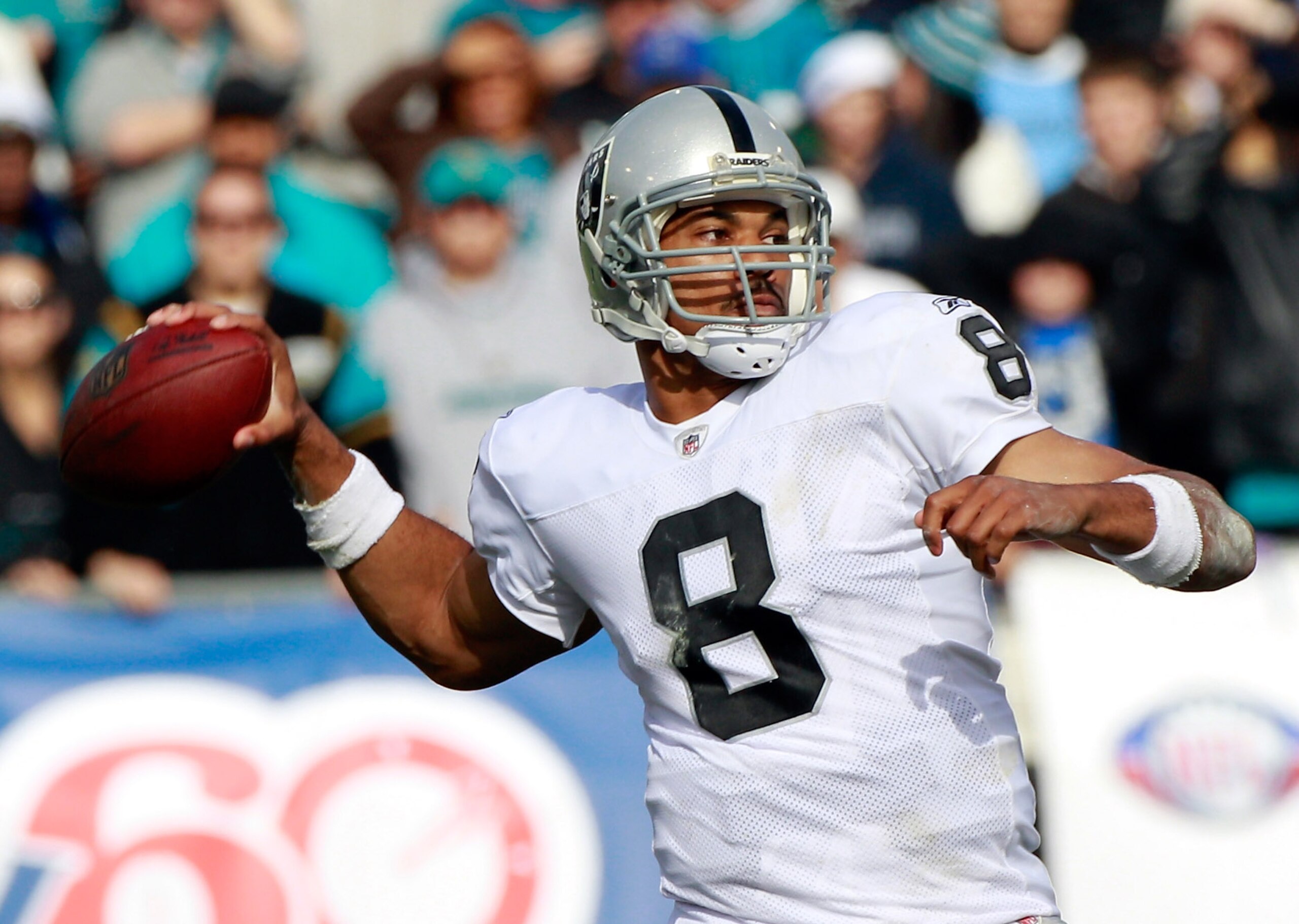 JACKSONVILLE, FL - DECEMBER 12:  Jason Campbell #8 of the Oakland Raiders attempts a pass during the game against the Jacksonville Jaguars at EverBank Field on December 12, 2010 in Jacksonville, Florida.  (Photo by Sam Greenwood/Getty Images)