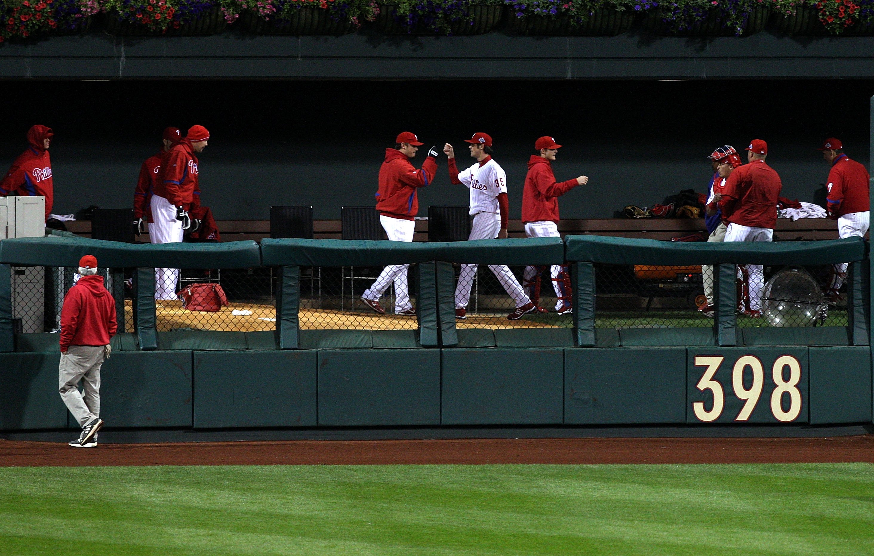 PHILADELPHIA - OCTOBER 27:  Starting pitcher Cole Hamels #35 of the Philadelphia Phillies greets his teammates in the bullpen before walking out to pitch against the Tampa Bay Rays during game five of the 2008 MLB World Series on October 27, 2008 at Citiz
