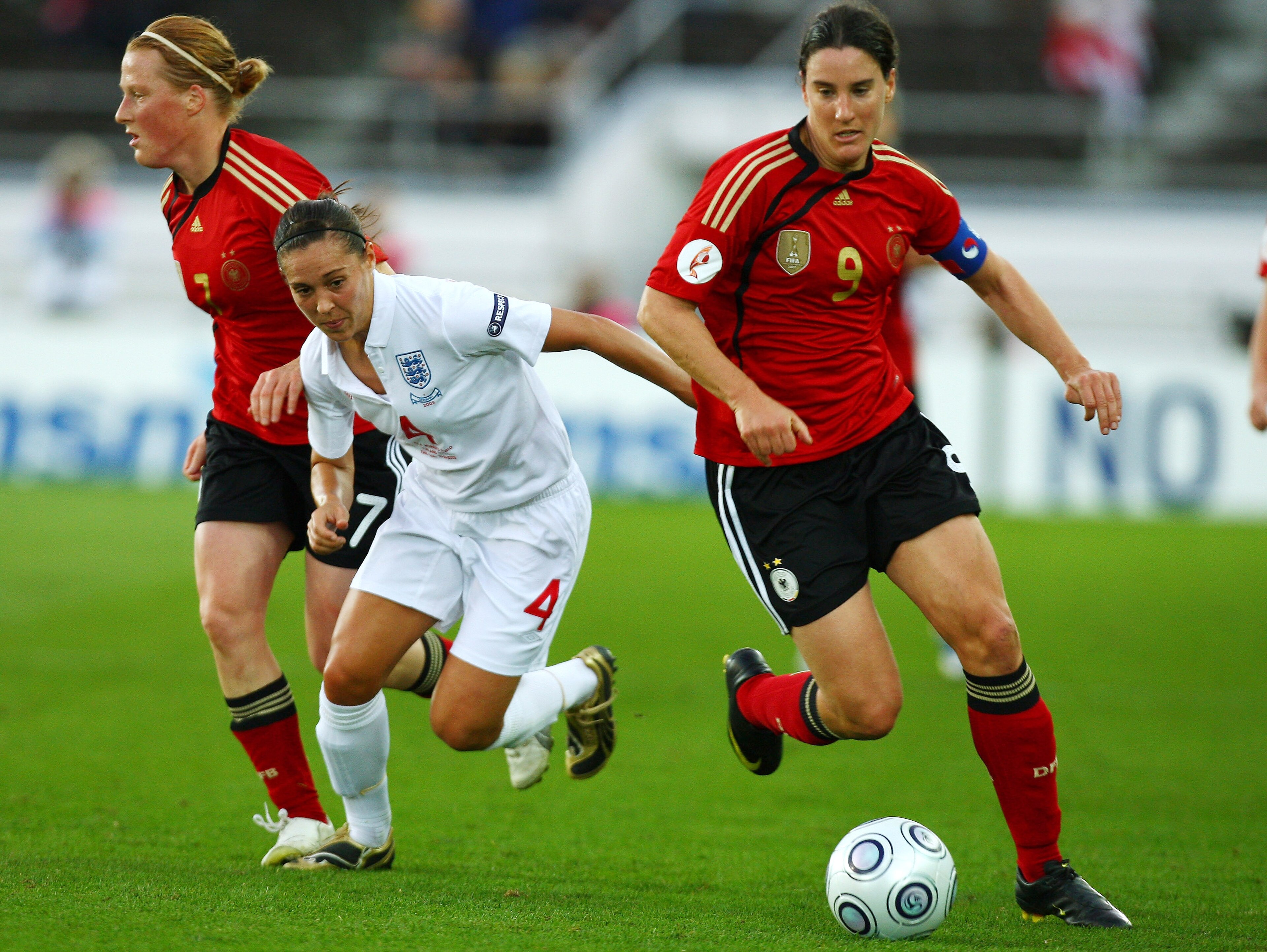 HELSINKI, FINLAND - SEPTEMBER 10: Fara Williams of England attempts to tackle Birgit Prinz of Germany during the UEFA Women's Euro 2009 Final match between England and Germany at the Helsinki Olympic Stadium on September 10, 2009 in Helsinki, Finland. ( HELSINKI, FINLAND - SEPTEMBER 10: Fara Williams of England attempts to tackle Birgit Prinz of Germany during the UEFA Women's Euro 2009 Final match between England and Germany at the Helsinki Olympic Stadium on September 10, 2009 in Helsinki, Finland. (
