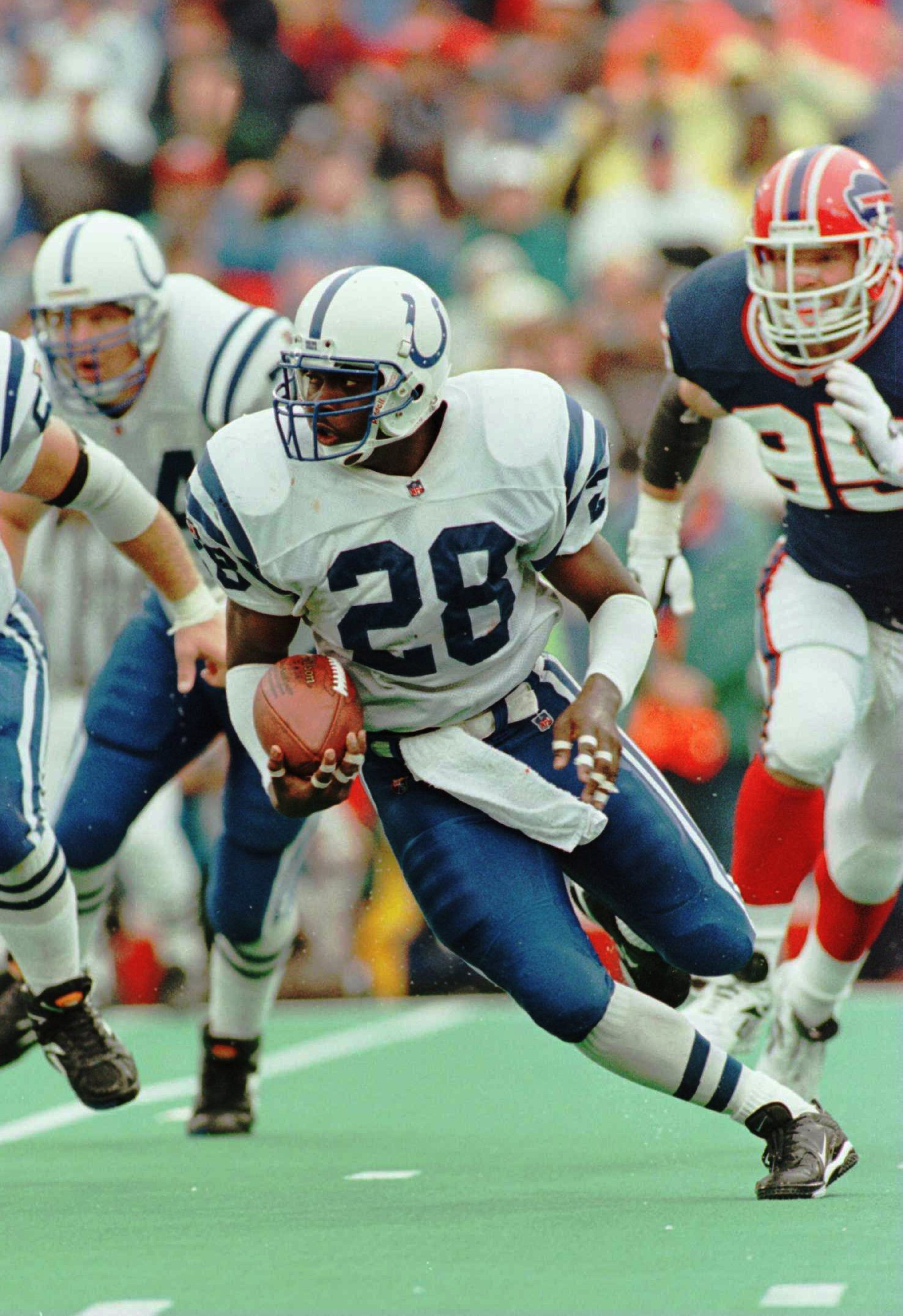 17 SEP 1995: RUNNING BACK MARSHALL FAULK OF THE INDIANAPOLIS COLTS POWERS HIS WAY TO IN ACTION AGAINST THE BUFFALO BILLS AT RICH STADIUM, ORCHARD PARK, NEW YORK. FAULK HAD TWO FIRST-HALF TOUCHDOWNS. Mandatory Credit: Rick Stewart/ALLSPORT 17 SEP 1995: RUNNING BACK MARSHALL FAULK OF THE INDIANAPOLIS COLTS POWERS HIS WAY TO IN ACTION AGAINST THE BUFFALO BILLS AT RICH STADIUM, ORCHARD PARK, NEW YORK. FAULK HAD TWO FIRST-HALF TOUCHDOWNS. Mandatory Credit: Rick Stewart/ALLSPORT