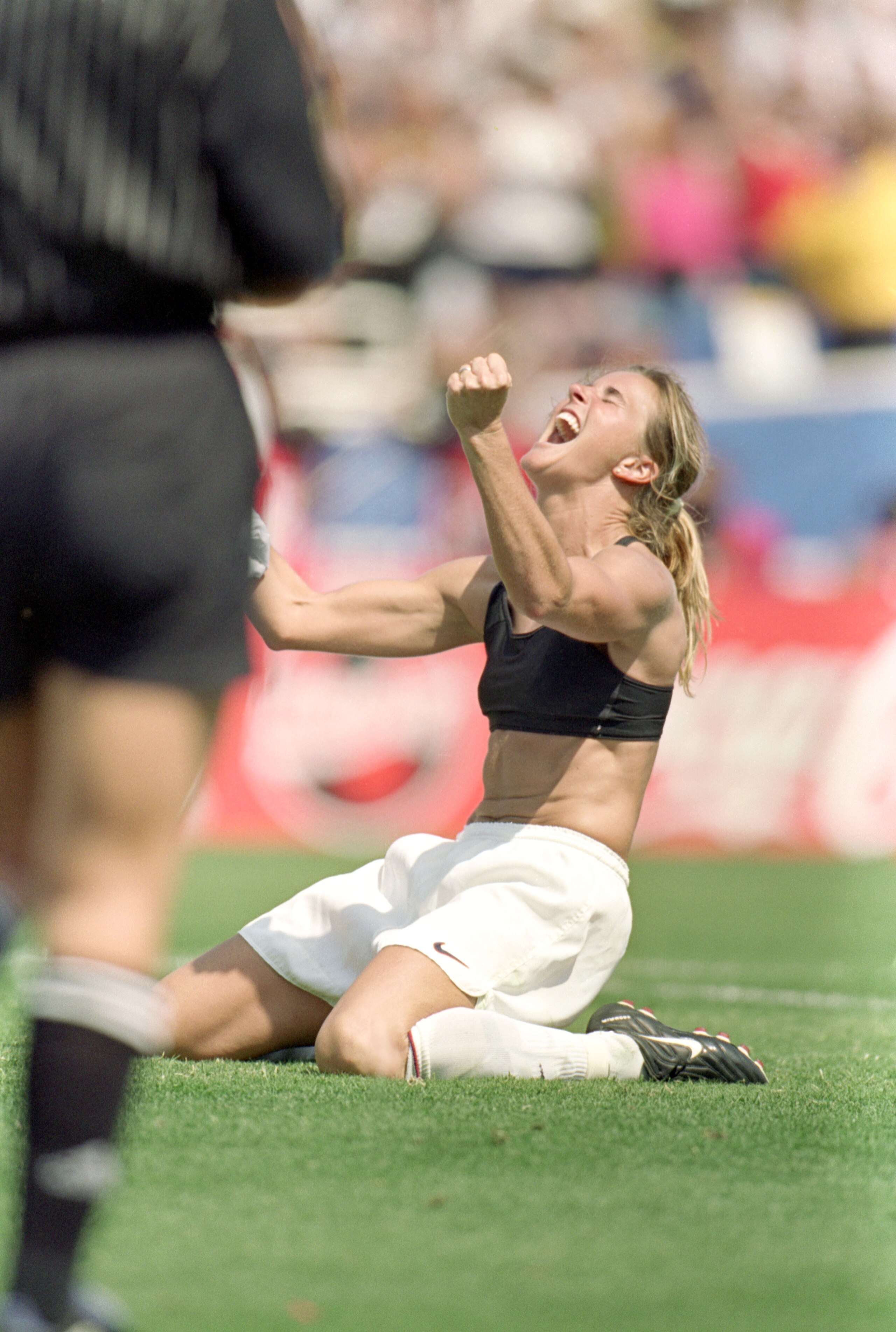 PASADENA, CA - JULY 10: Brandi Chastain of Team USA celebrates during the Women's World Cup against Team China at The Rose Bowl on July 10, 1999 in Pasadena, California. Team USA won 5-4. (Photo by Jed Jacobsohn/Getty Images) PASADENA, CA - JULY 10: Brandi Chastain of Team USA celebrates during the Women's World Cup against Team China at The Rose Bowl on July 10, 1999 in Pasadena, California. Team USA won 5-4. (Photo by Jed Jacobsohn/Getty Images)