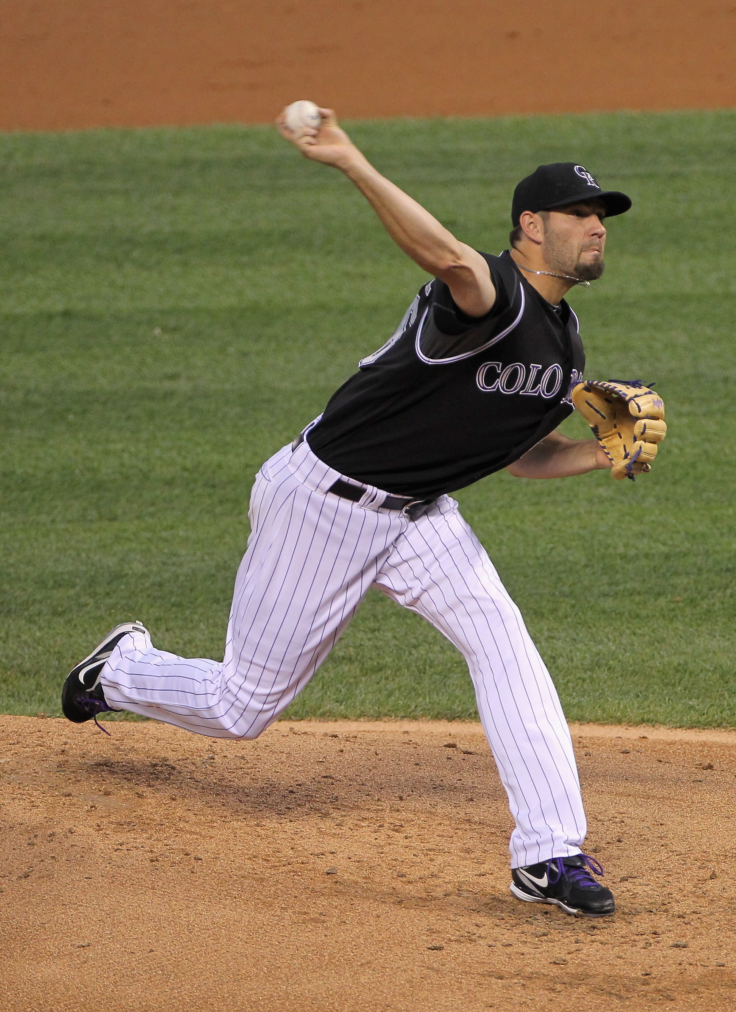 DENVER - SEPTEMBER 14:  Starting pitcher Jason Hammel #46 of the Colorado Rockies delivers against the San Diego Padres at Coors Field on September 14, 2010 in Denver, Colorado.  (Photo by Doug Pensinger/Getty Images)