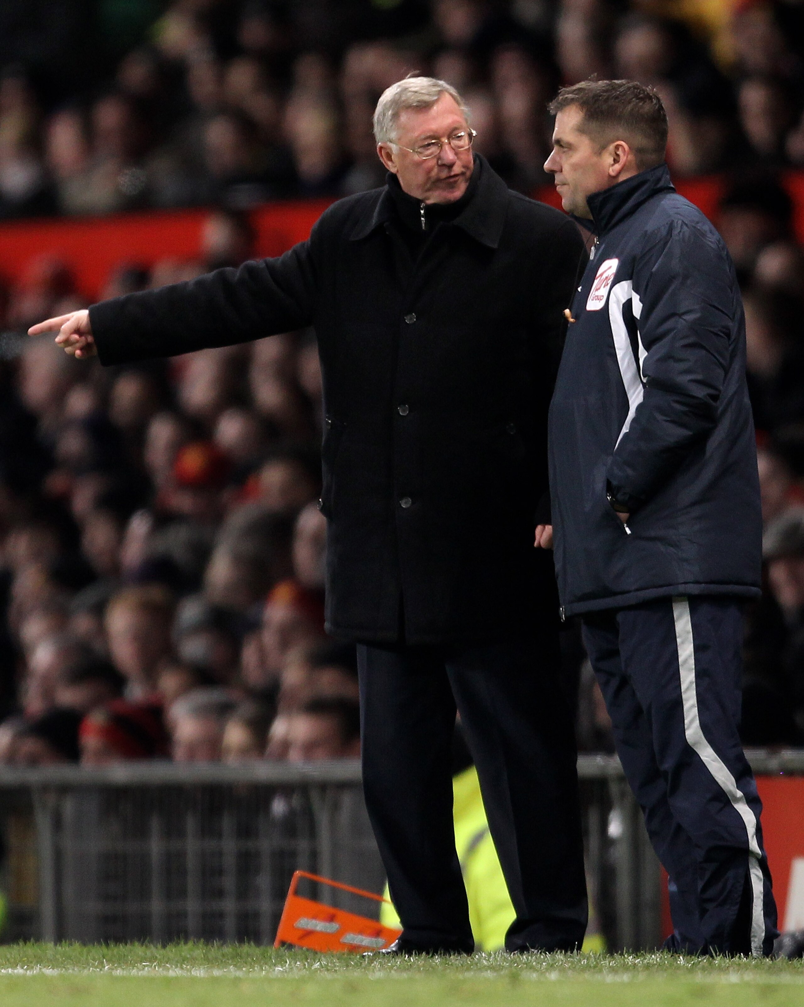 MANCHESTER, ENGLAND - DECEMBER 13: Manchester United Manager Sir Alex Ferguson protests to Fourth Official Phil Dowd during the Barclays Premier League match between Manchester United and Arsenal at Old Trafford on December 13, 2010 in Manchester, Englan MANCHESTER, ENGLAND - DECEMBER 13: Manchester United Manager Sir Alex Ferguson protests to Fourth Official Phil Dowd during the Barclays Premier League match between Manchester United and Arsenal at Old Trafford on December 13, 2010 in Manchester, Englan