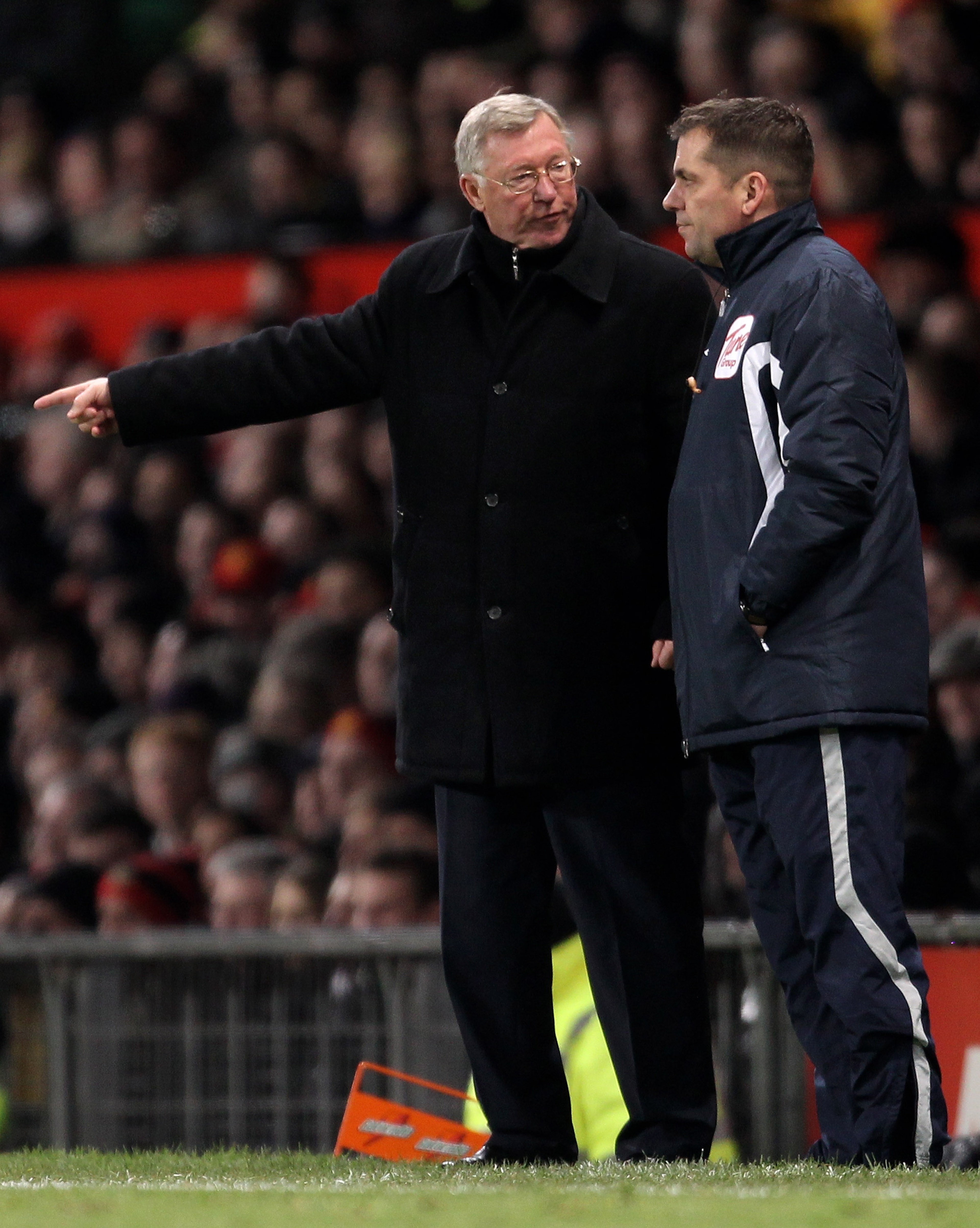 MANCHESTER, ENGLAND - DECEMBER 13: Manchester United Manager Sir Alex Ferguson protests to Fourth Official Phil Dowd during the Barclays Premier League match between Manchester United and Arsenal at Old Trafford on December 13, 2010 in Manchester, Englan MANCHESTER, ENGLAND - DECEMBER 13: Manchester United Manager Sir Alex Ferguson protests to Fourth Official Phil Dowd during the Barclays Premier League match between Manchester United and Arsenal at Old Trafford on December 13, 2010 in Manchester, Englan