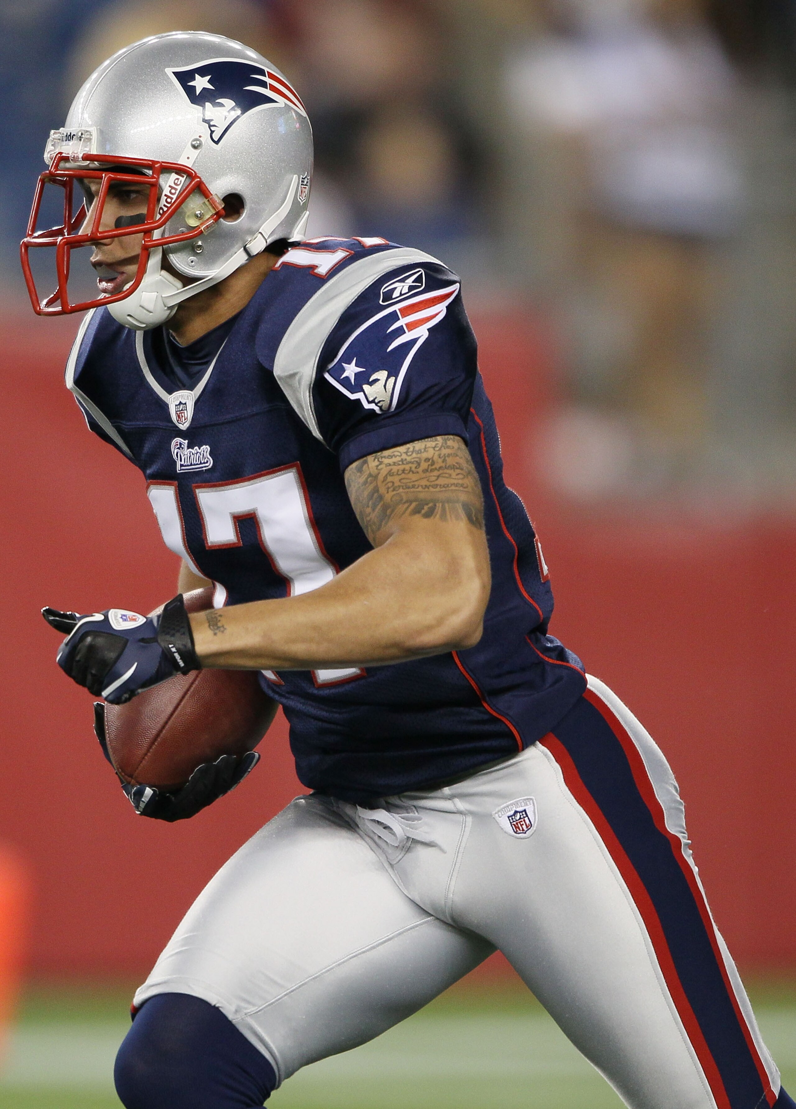 FOXBORO, MA - AUGUST 26:  Taylor Price #17 of the New England Patriots carries the ball against the St. Louis Rams on August 26, 2010 at Gillette Stadium in Foxboro, Massachusetts. The Rams defeated the Patriots 36-35.  (Photo by Elsa/Getty Images)