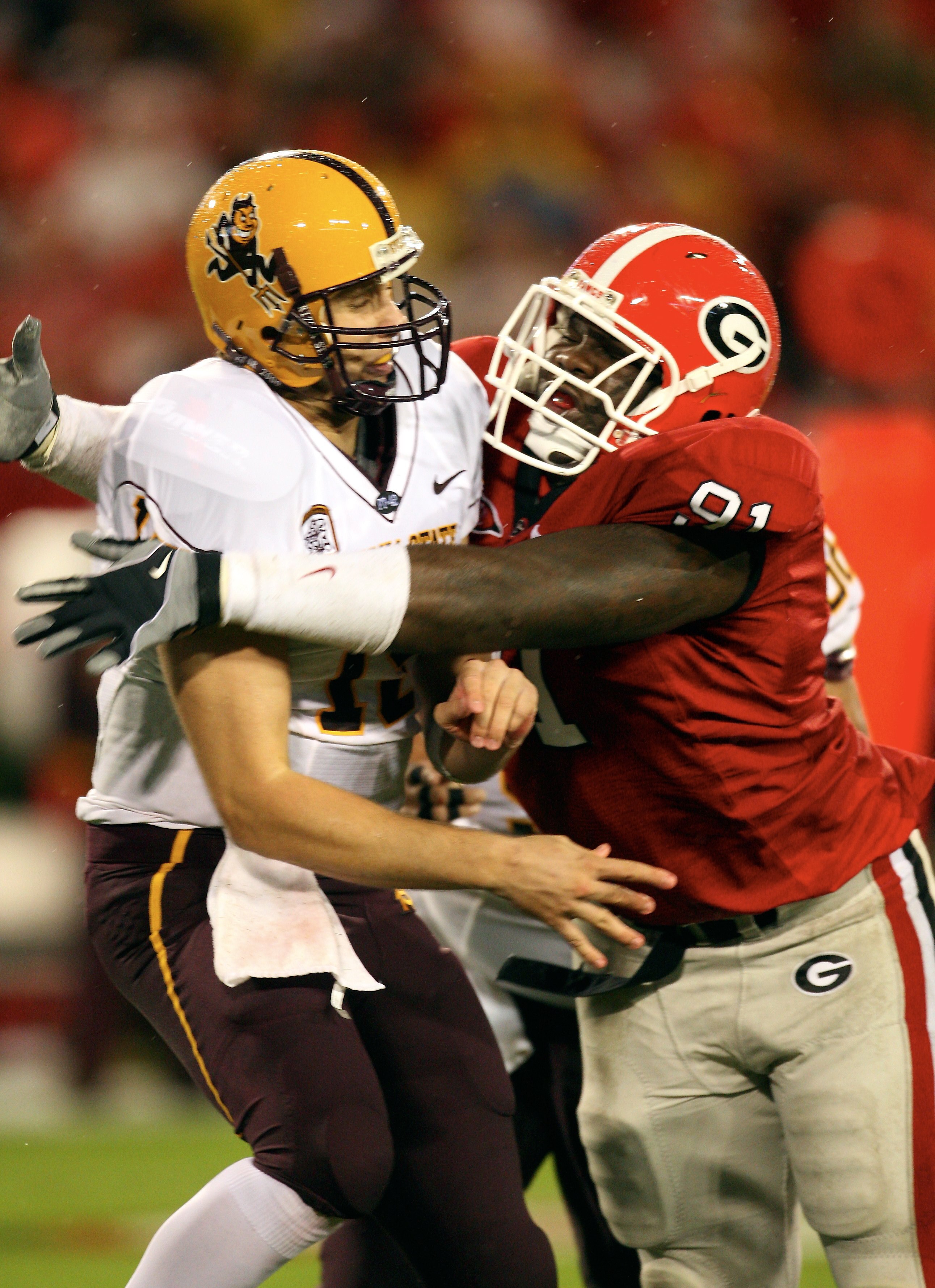 ATHENS, GA - SEPTEMBER 26: Kade Weston #91 of the Georgia Bulldogs pressures Danny Sullivan #15 of the Arizona State Sun Devils at Sanford Stadium on September 26, 2009 in Athens, Georgia. (Photo by Scott Cunningham/Getty Images)