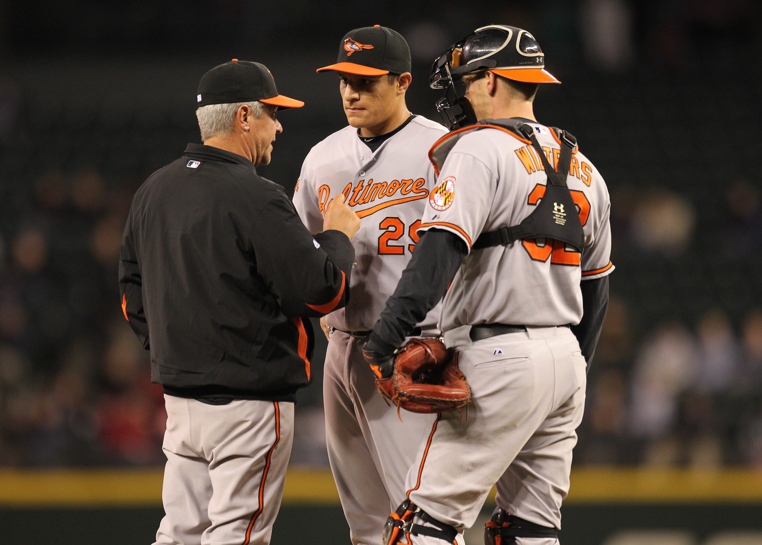 SEATTLE - APRIL 20:  Starting pitcher David Hernandez #29 of the Baltimore Orioles talks with pitching coach Rick Kranitz during the game against the Seattle Mariners at Safeco Field on April 20, 2010 in Seattle, Washington. (Photo by Otto Greule Jr/Getty