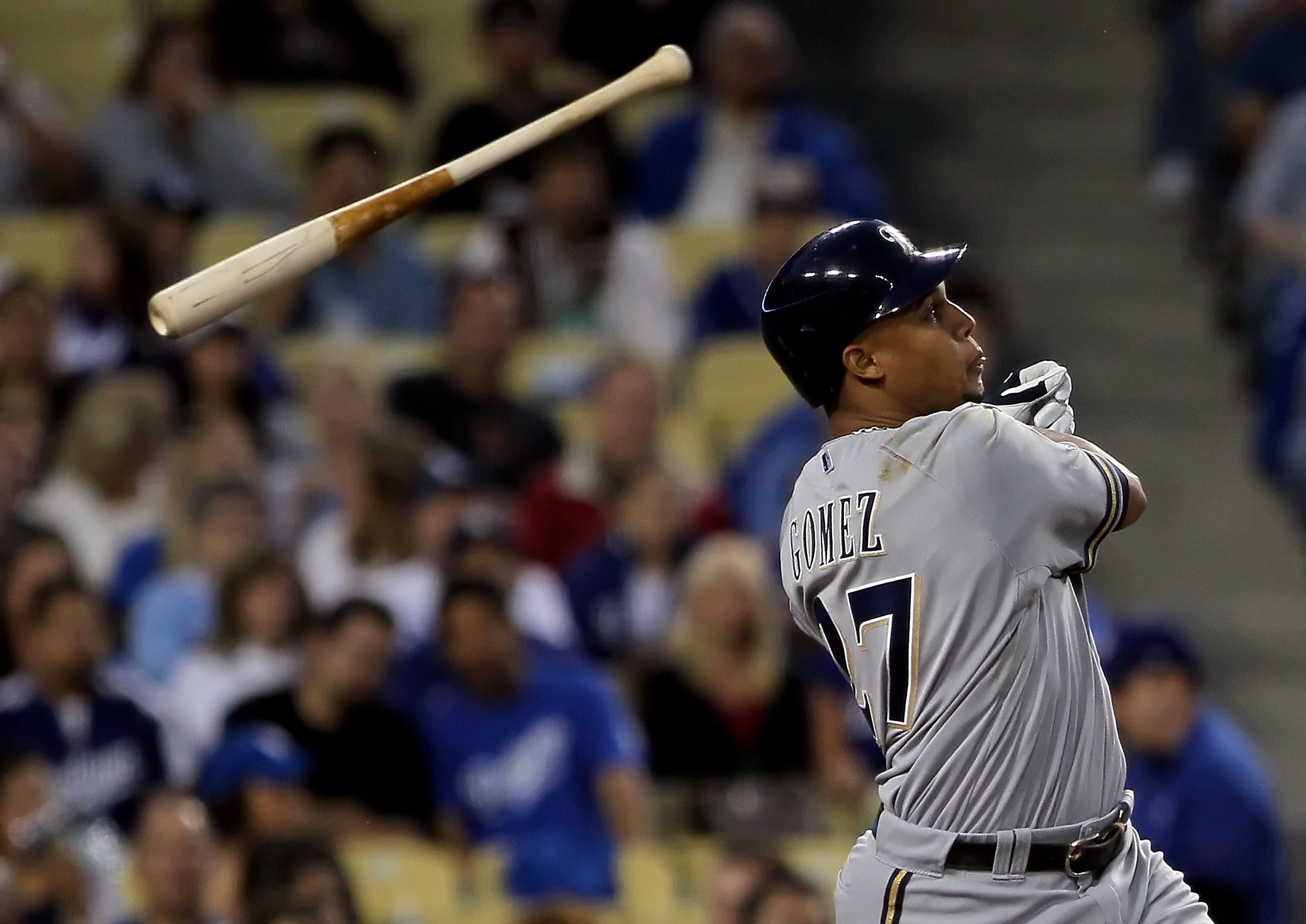 LOS ANGELES, CA - MAY 04:  Carlos Gomez #27 of the Milwaukee Brewers loses his bat in the second inning against the Los Angeles Dodgers at Dodger Stadium on May 4, 2010 in Los Angeles, California.  (Photo by Jeff Gross/Getty Images)