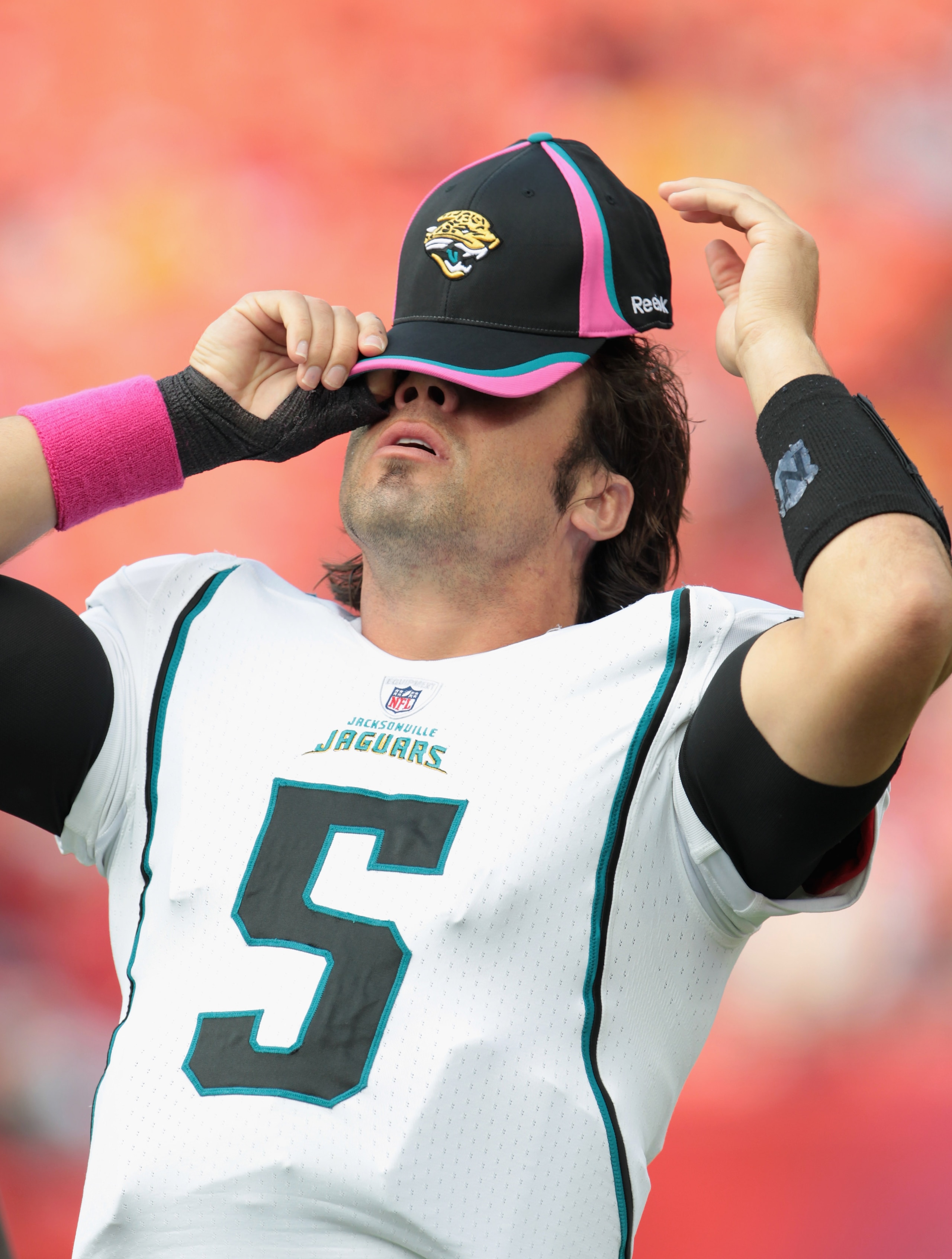 KANSAS CITY, MO - OCTOBER 24:  Quarterback Trent Edwards #5 of the Jacksonville Jaguars adjusts his hat during player warm-ups prior to the game against the Kansas City Chiefs on October 24, 2010 at Arrowhead Stadium in Kansas City, Missouri.  (Photo by J
