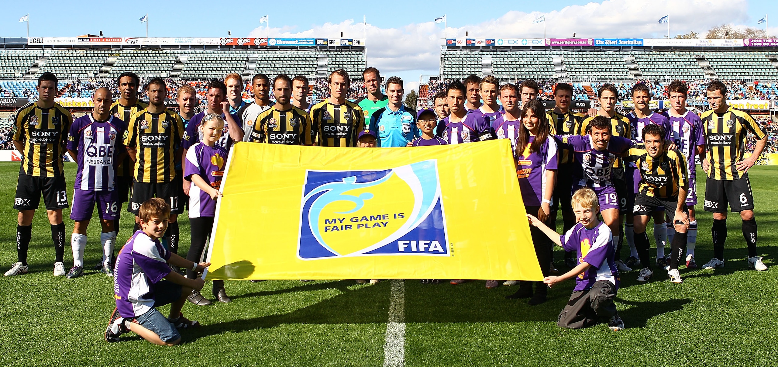 PERTH, AUSTRALIA - SEPTEMBER 05: Players and officials pose to promote FIFA Fair Play during the round five A-League match between the Perth Glory and the Wellington Phoenix at nib Stadium on September 5, 2010 in Perth, Australia. (Photo by Paul Kane/Ge PERTH, AUSTRALIA - SEPTEMBER 05: Players and officials pose to promote FIFA Fair Play during the round five A-League match between the Perth Glory and the Wellington Phoenix at nib Stadium on September 5, 2010 in Perth, Australia. (Photo by Paul Kane/Ge