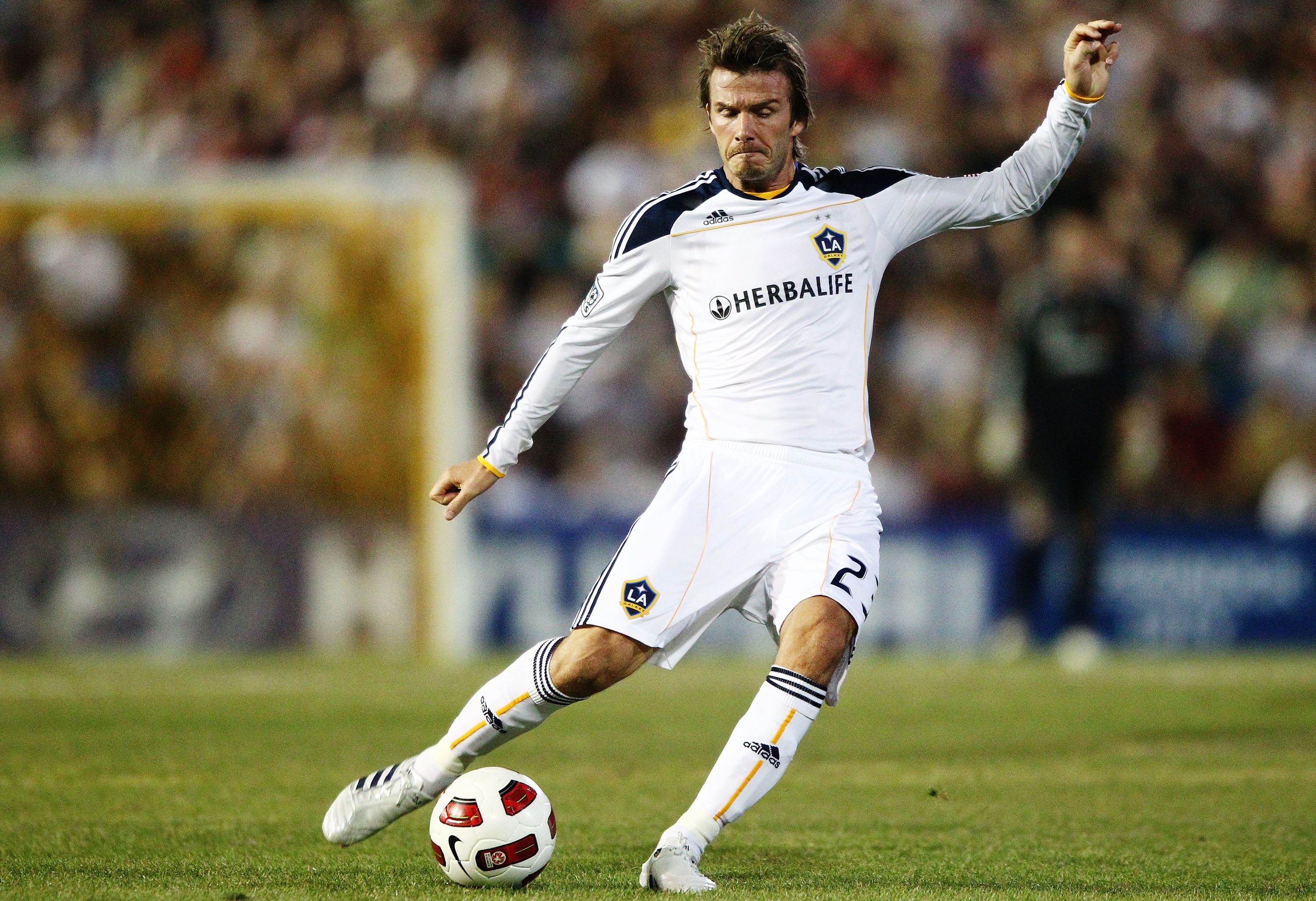 NEWCASTLE, AUSTRALIA - NOVEMBER 27:  David Beckham of the Galaxy Shoots for goal during the friendly match between the Newcastle Jets and the LA Galaxy at EnergyAustralia Stadium on November 27, 2010 in Newcastle, Australia.  (Photo by Brendon Thorne/Gett