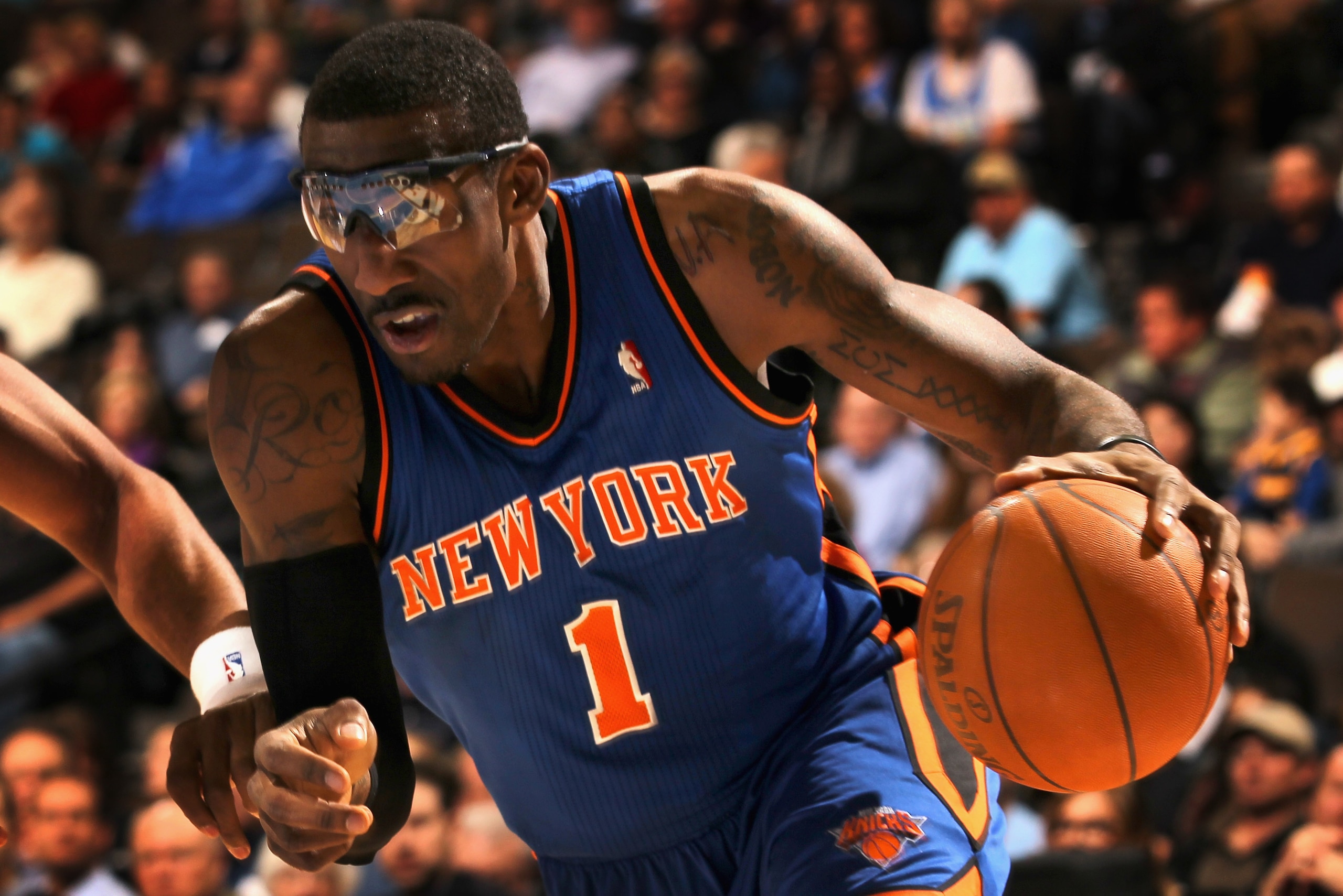 DENVER - NOVEMBER 16:  Amar'e Stoudemire #1 of the New York Knicks drive the ball against the Denver Nuggets at the Pepsi Center on November 16, 2010 in Denver, Colorado. The Nuggets defeated the Knicks 120-118. NOTE TO USER: User expressly acknowledges a