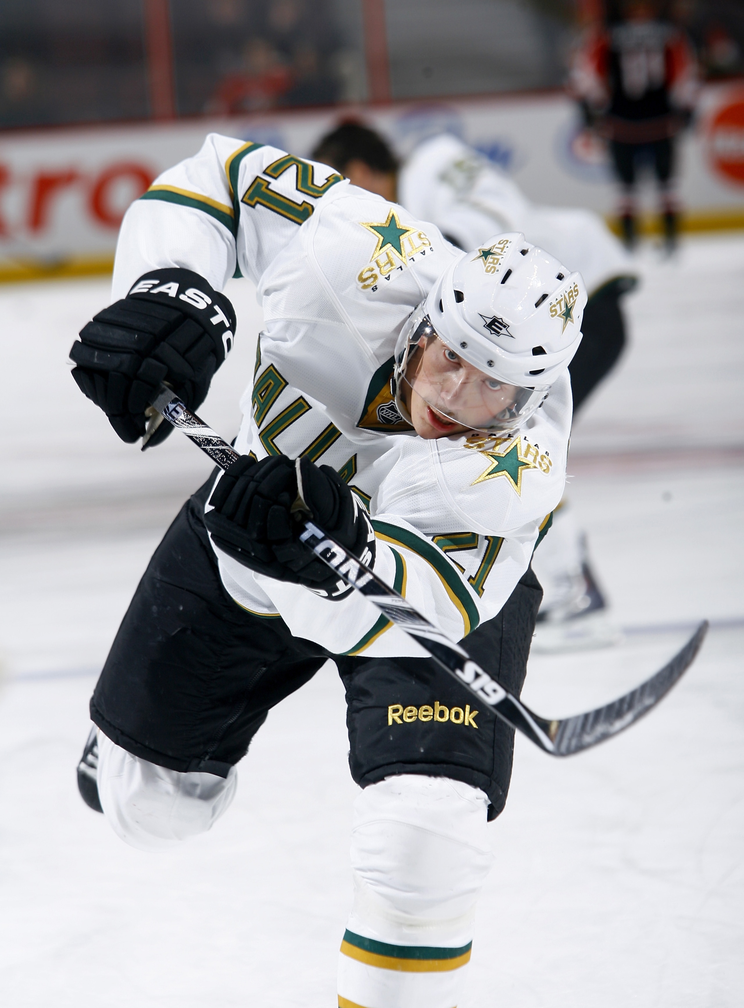 OTTAWA, ON - NOVEMBER 24: Loui Eriksson #21 of the Dallas Stars fires a shot on net during warmup before a game against the Ottawa Senators at Scotiabank Place on November 24, 2010 in Ottawa, Ontario, Canada. (Photo by Phillip MacCallum/Getty Images)