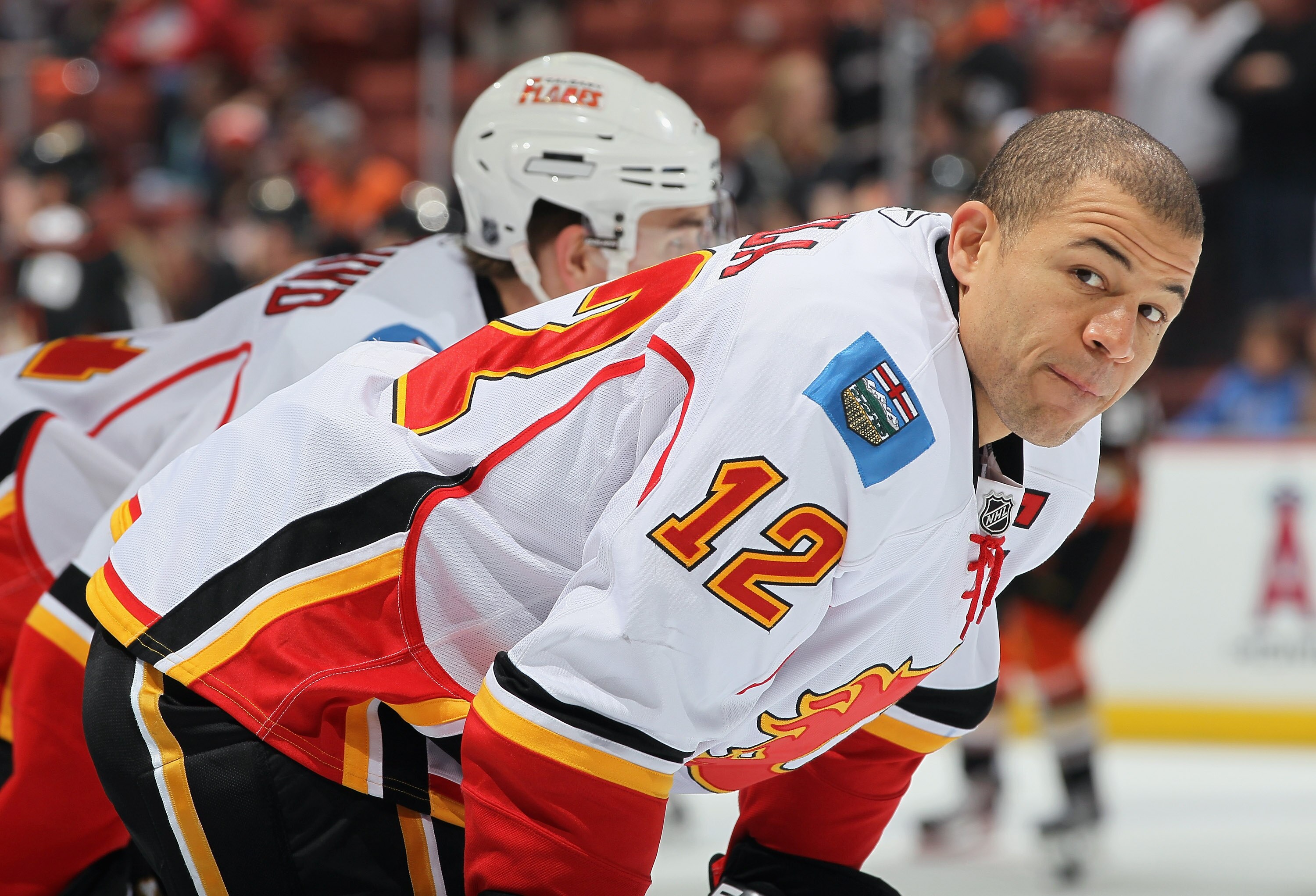 ANAHEIM, CA - DECEMBER 10:  Jerome Iginla #12 of the Calgary Flames looks on prior to the start of the game against the Anaheim Ducks at the Honda Center on December 10, 2010 in Anaheim, California.  (Photo by Jeff Gross/Getty Images)