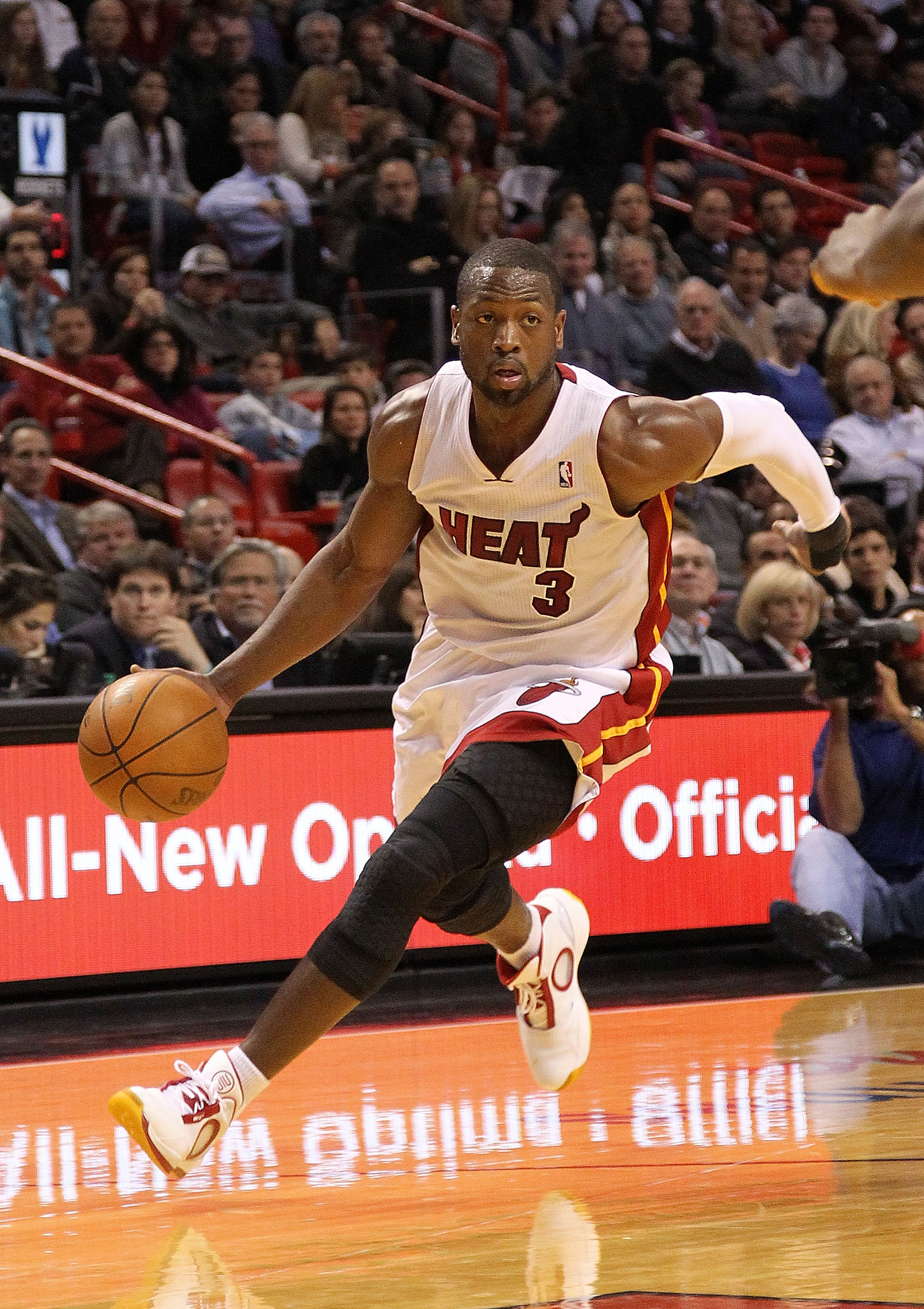 MIAMI, FL - DECEMBER 13:  Dwyane Wade #3 of the Miami Heat drives to the hoop during a game against the New Orleans Hornets at American Airlines Arena on December 13, 2010 in Miami, Florida. NOTE TO USER: User expressly acknowledges and agrees that, by do