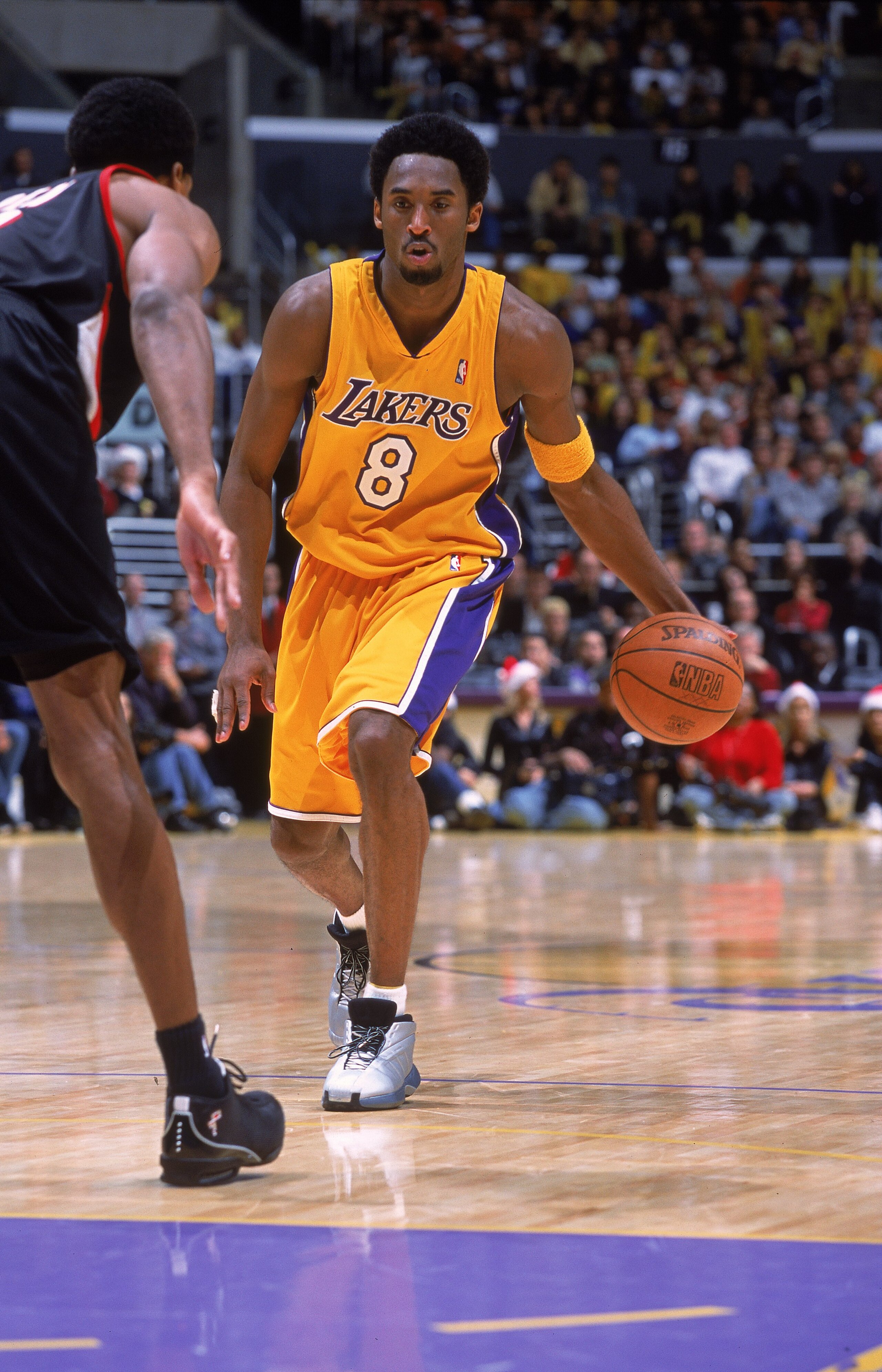 25 Dec 2000:  Kobe Bryant #8 of the Los Angeles Lakers moves with the ball during the game against the Portland Trail Blazers at the STAPLES Center in Los Angeles, California. The Trail Blazers defeated the Lakers 109-104.   NOTE TO USER: It is expressly 