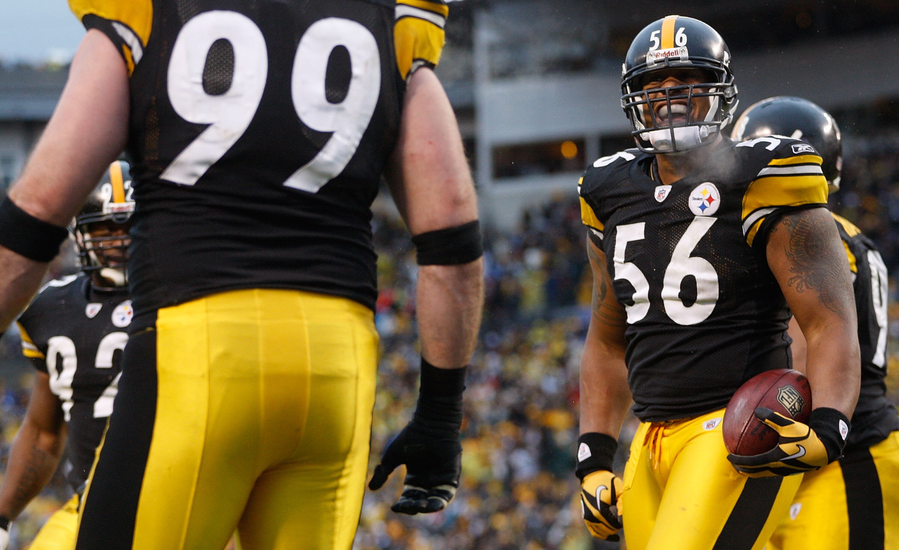 PITTSBURGH - DECEMBER 12:  LaMarr Woodley #56 of the Pittsburgh Steelers celebrates after returning an interception for a touchdown against the Cincinnati Bengals during the game on December 12, 2010 at Heinz Field in Pittsburgh, Pennsylvania.  (Photo by