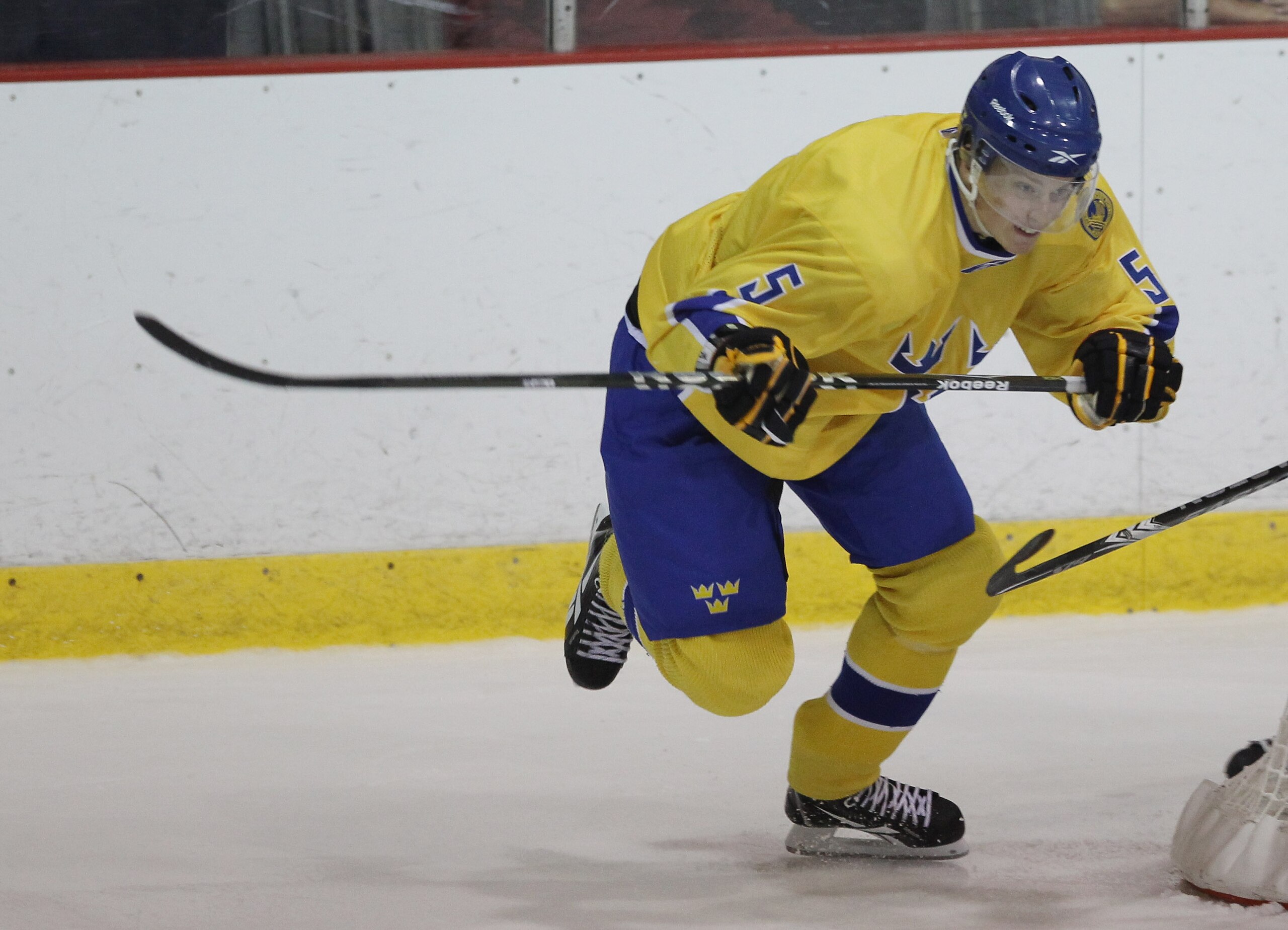 LAKE PLACID, NY - AUGUST 03:  Adam Larsson #5 of Team Sweden skates against Team USA at the USA Hockey National Evaluation Camp on August 3, 2010 in Lake Placid, New York. Team USA defeated Team Sweden 6-3.  (Photo by Bruce Bennett/Getty Images)