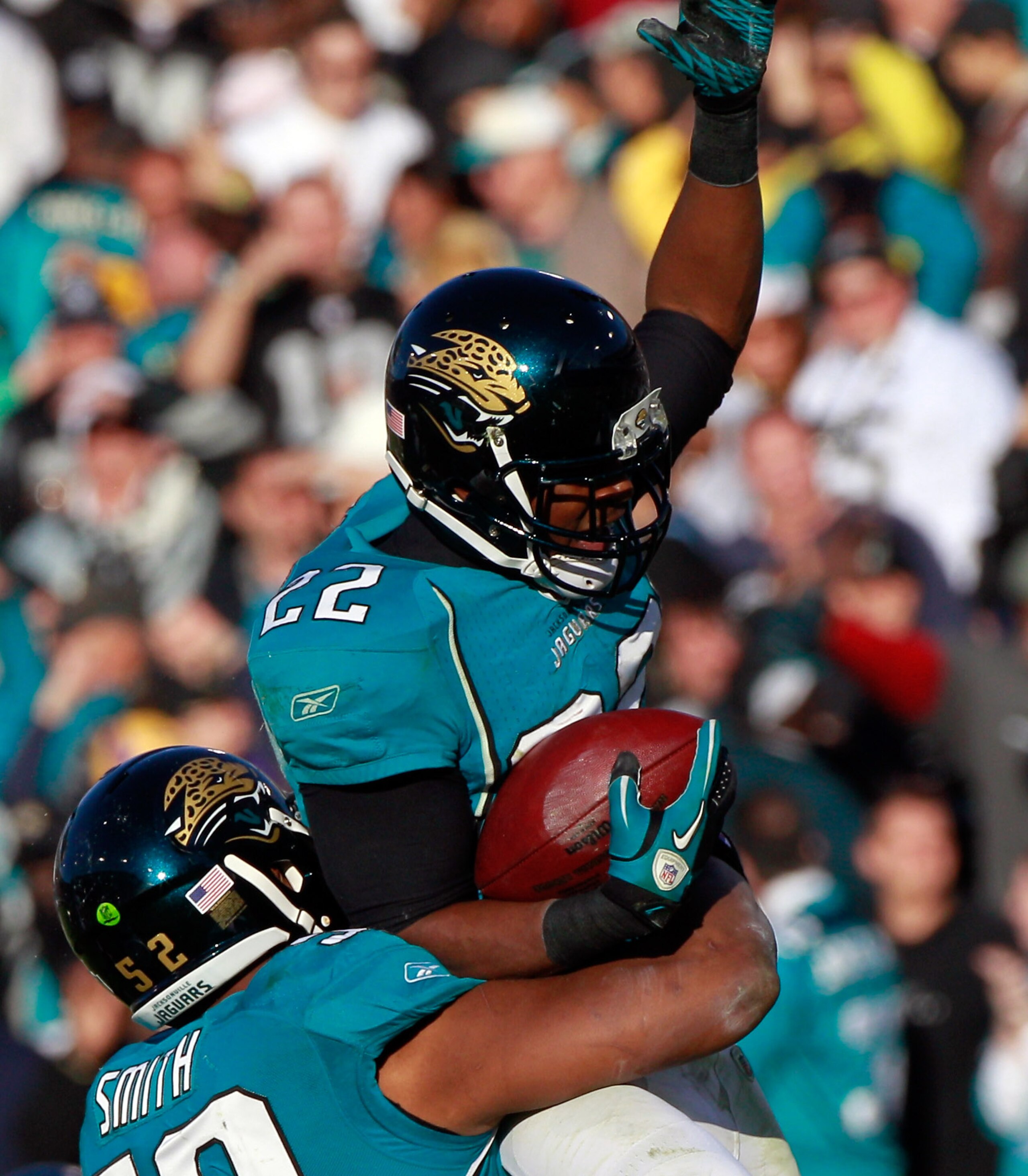 JACKSONVILLE, FL - DECEMBER 12: Don Carey #22 of the Jacksonville Jaguars is lifted in to the air by Daryl Smith #52 following an interception against the Oakland Raiders during the game at EverBank Field on December 12, 2010 in Jacksonville, Florida. ( JACKSONVILLE, FL - DECEMBER 12: Don Carey #22 of the Jacksonville Jaguars is lifted in to the air by Daryl Smith #52 following an interception against the Oakland Raiders during the game at EverBank Field on December 12, 2010 in Jacksonville, Florida. (