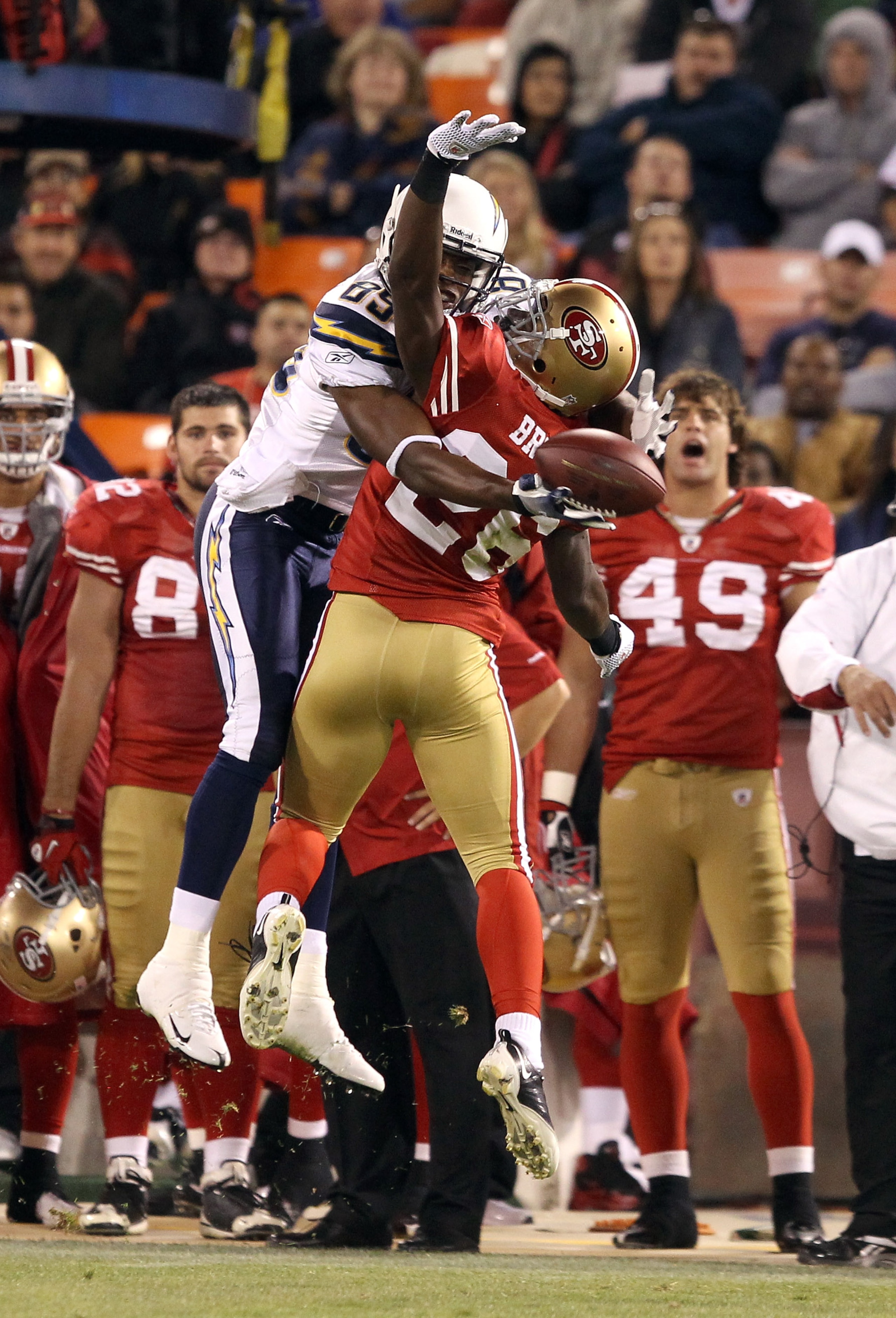 SAN FRANCISCO - SEPTEMBER 02:  Tramaine Brock #26 of the San Francisco 49ers is called for pass interference when he tried to break up a pass intended for Seyi Ajirotutu #89 of the San Diego Chargers at Candlestick Park  on September 2, 2010 in San Franci