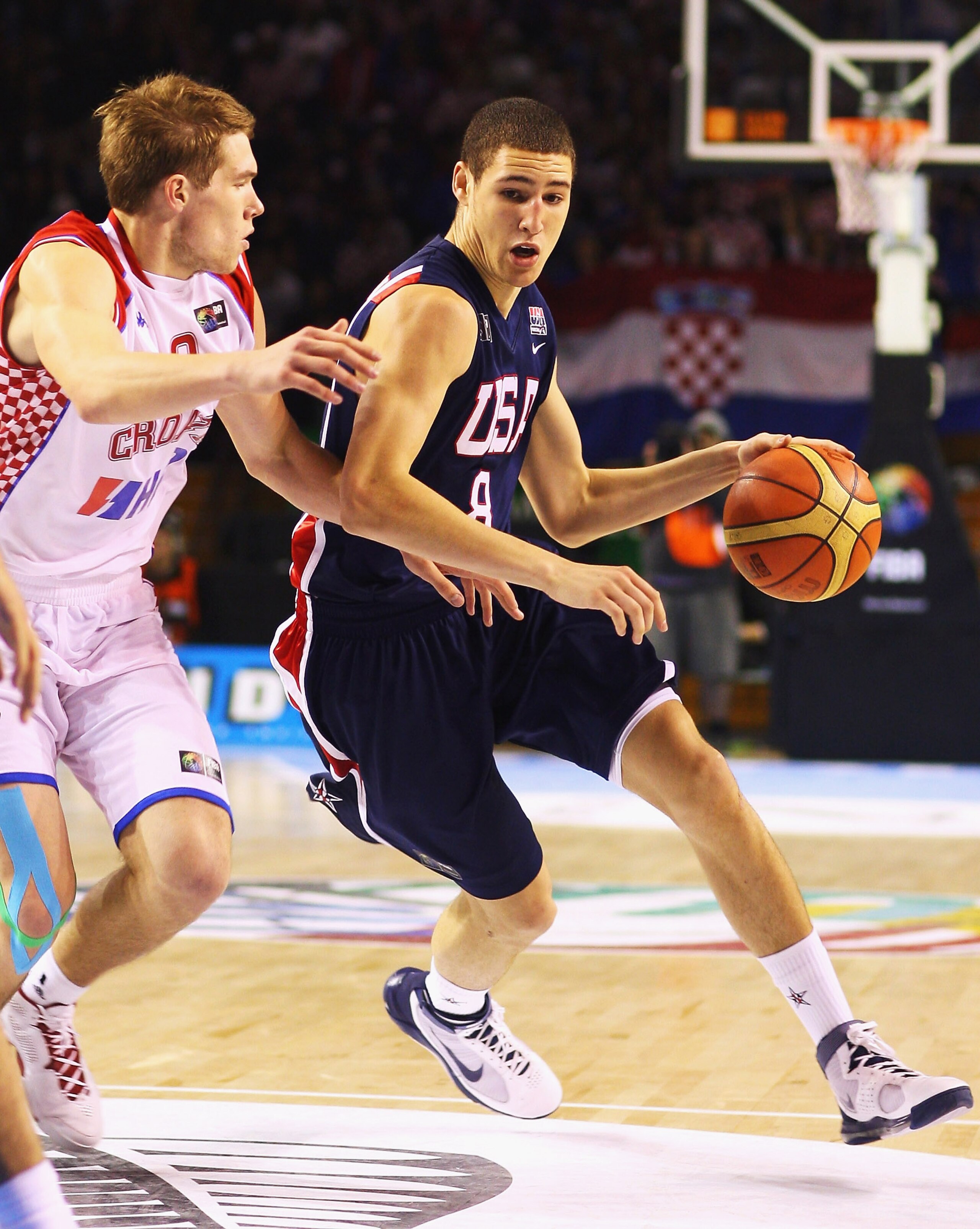 AUCKLAND, NEW ZEALAND - JULY 11:  Klay Thompson of the USA is put under pressure from Sime Olivari of Croatia during the U19 Basketball World Championships Semi-Final match between Croatia and the United States of America at North Shore Events Centre on J