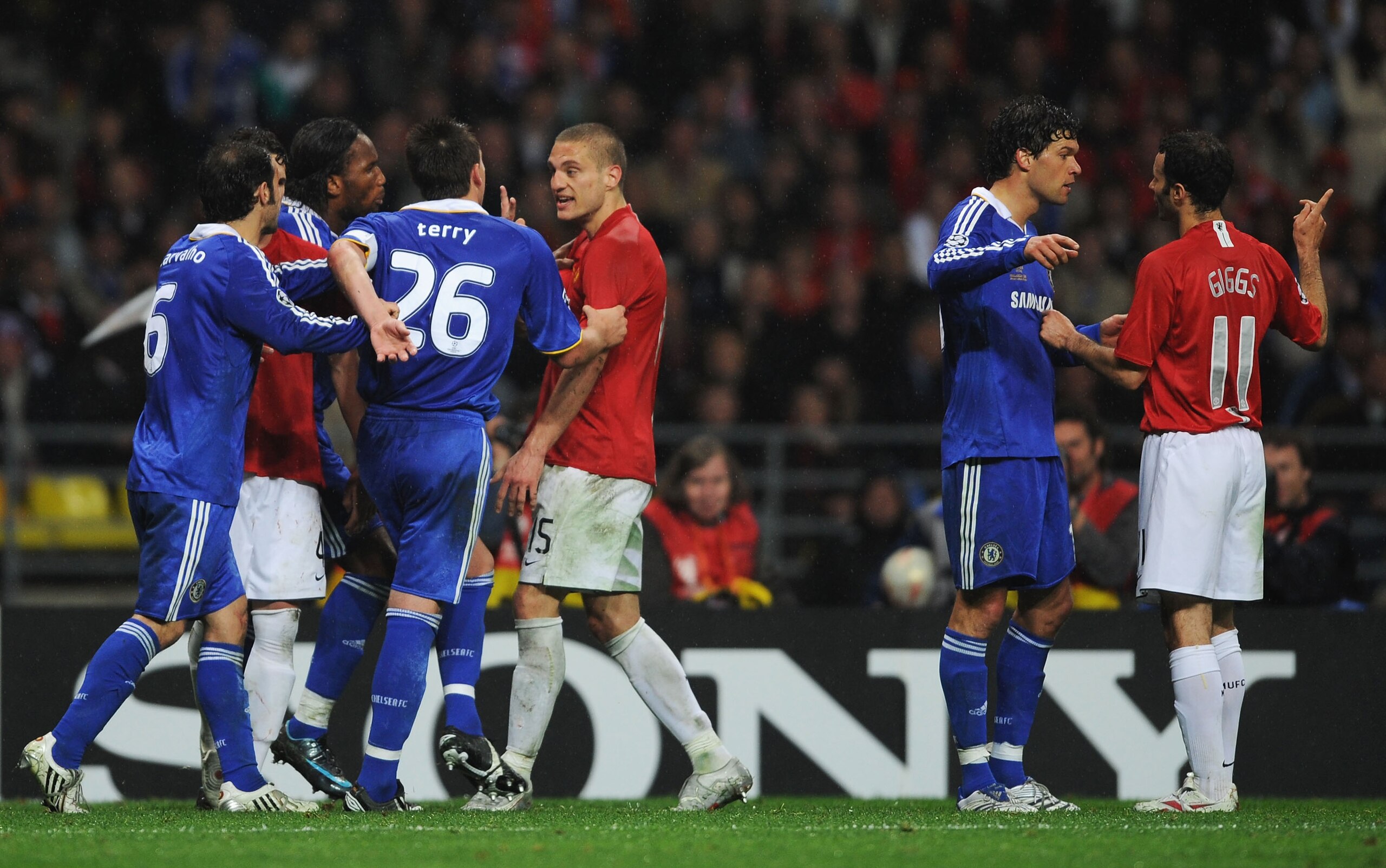 MOSCOW - MAY 21:  John Terry and Didier Drogba of Chelsea argues with Nemanja Vidic of Manchester Unirted during the UEFA Champions League Final match between Manchester United and Chelsea at the Luzhniki Stadium on May 21, 2008 in Moscow, Russia.  (Photo