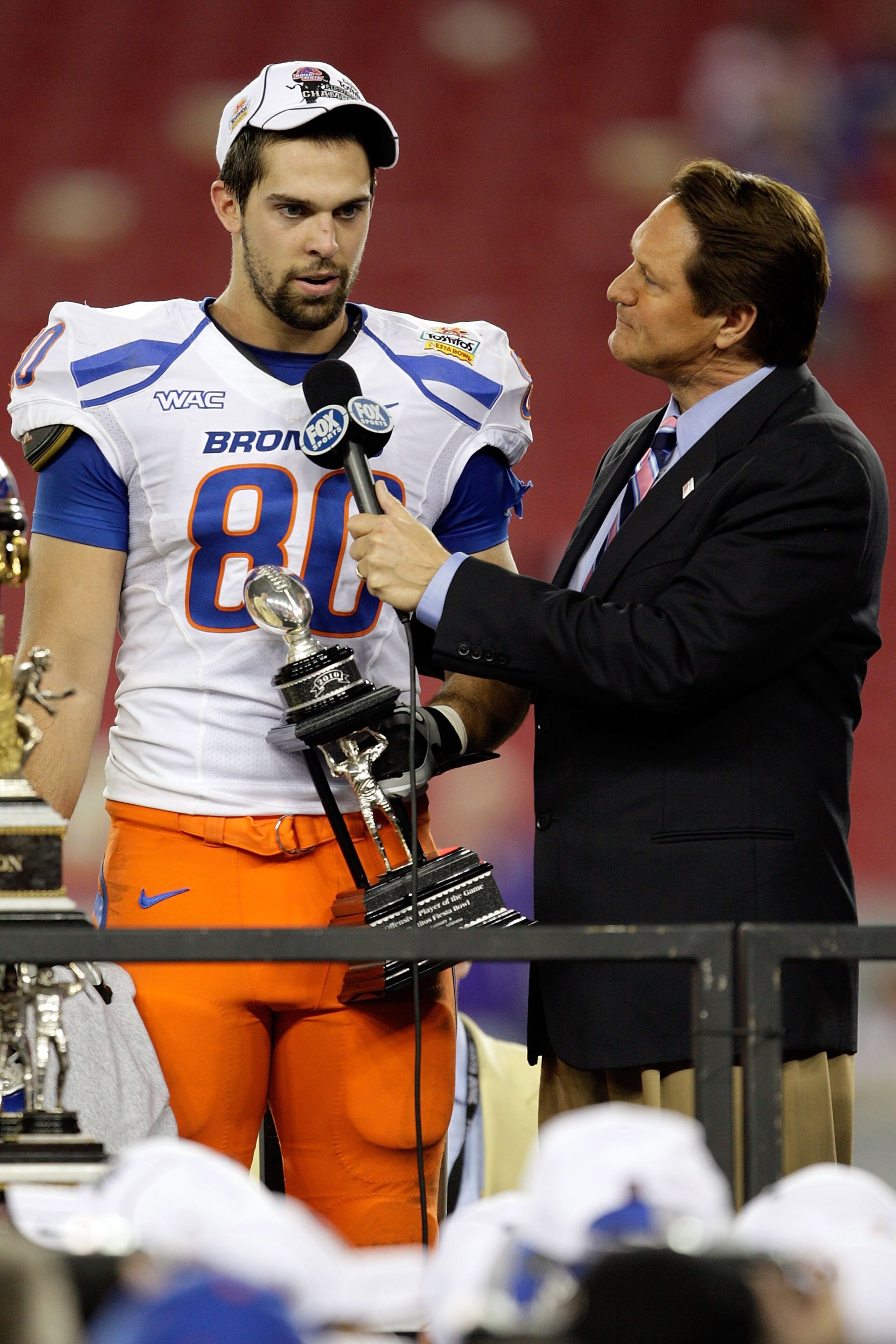 GLENDALE, AZ - JANUARY 04:  Kyle Efaw #80 of the Boise State Broncos answers questions from Fox Sports' Chris Myers  with his offensive MVP award after defeating the TCU Horned Frogs 17-10 during the Tostitos Fiesta Bowl at the Universtity of Phoenix Stad