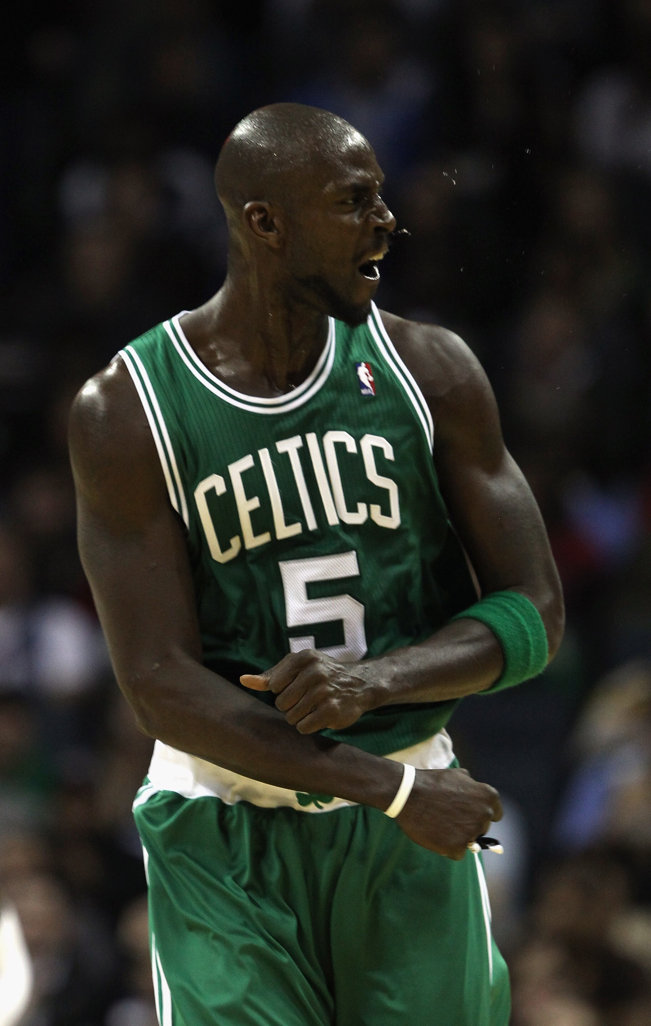 CHARLOTTE, NC - DECEMBER 11:  Kevin Garnett #5 of the Boston Celtics reacts to making a basket against the Charlotte Bobcats during their game at Time Warner Cable Arena on December 11, 2010 in Charlotte, North Carolina. NOTE TO USER: User expressly ackno