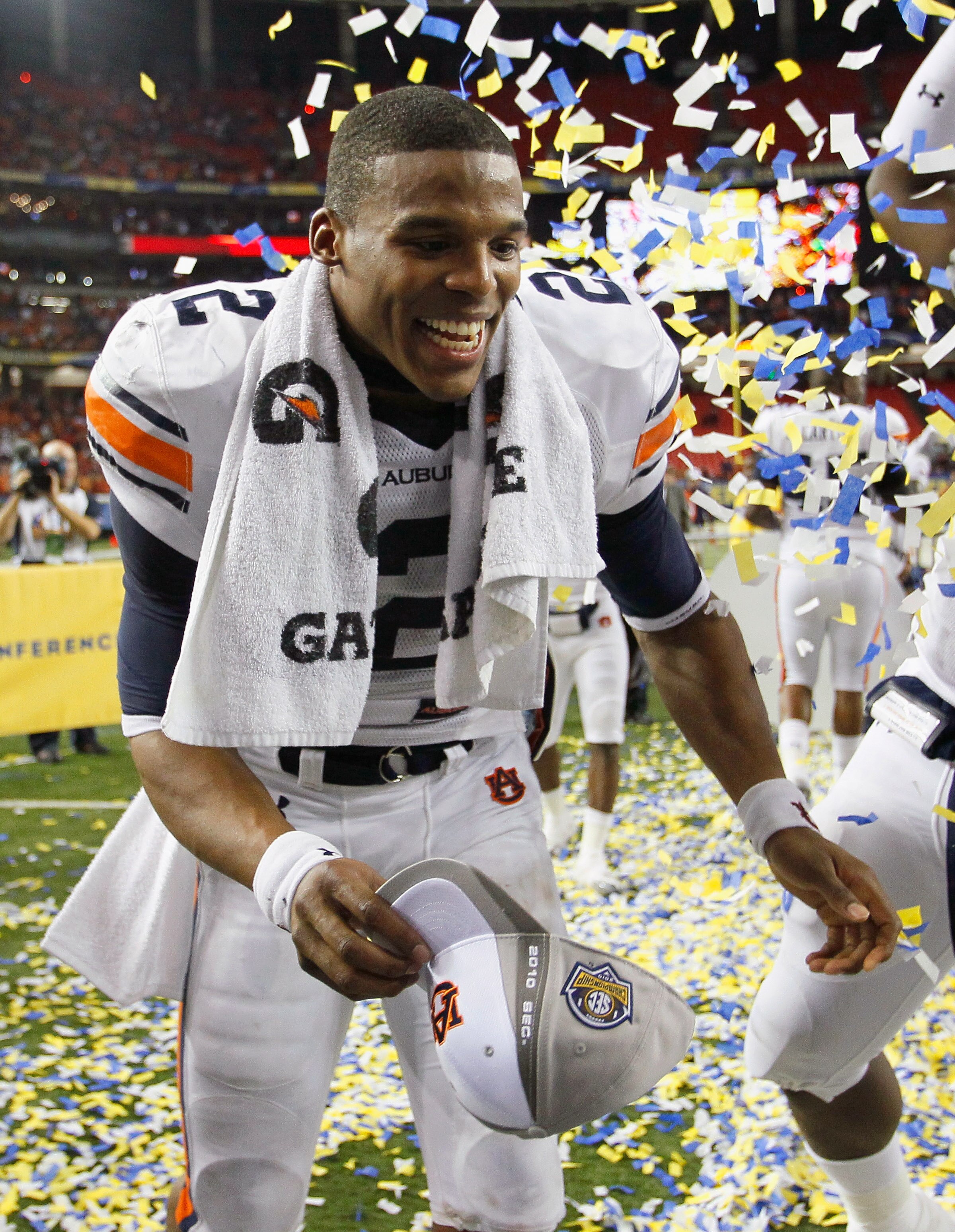 ATLANTA, GA - DECEMBER 04:  Quarterback Cam Newton #2 of the Auburn Tigers celebrates after their 56-17 win over the South Carolina Gamecocks during the 2010 SEC Championship at Georgia Dome on December 4, 2010 in Atlanta, Georgia.  (Photo by Kevin C. Cox