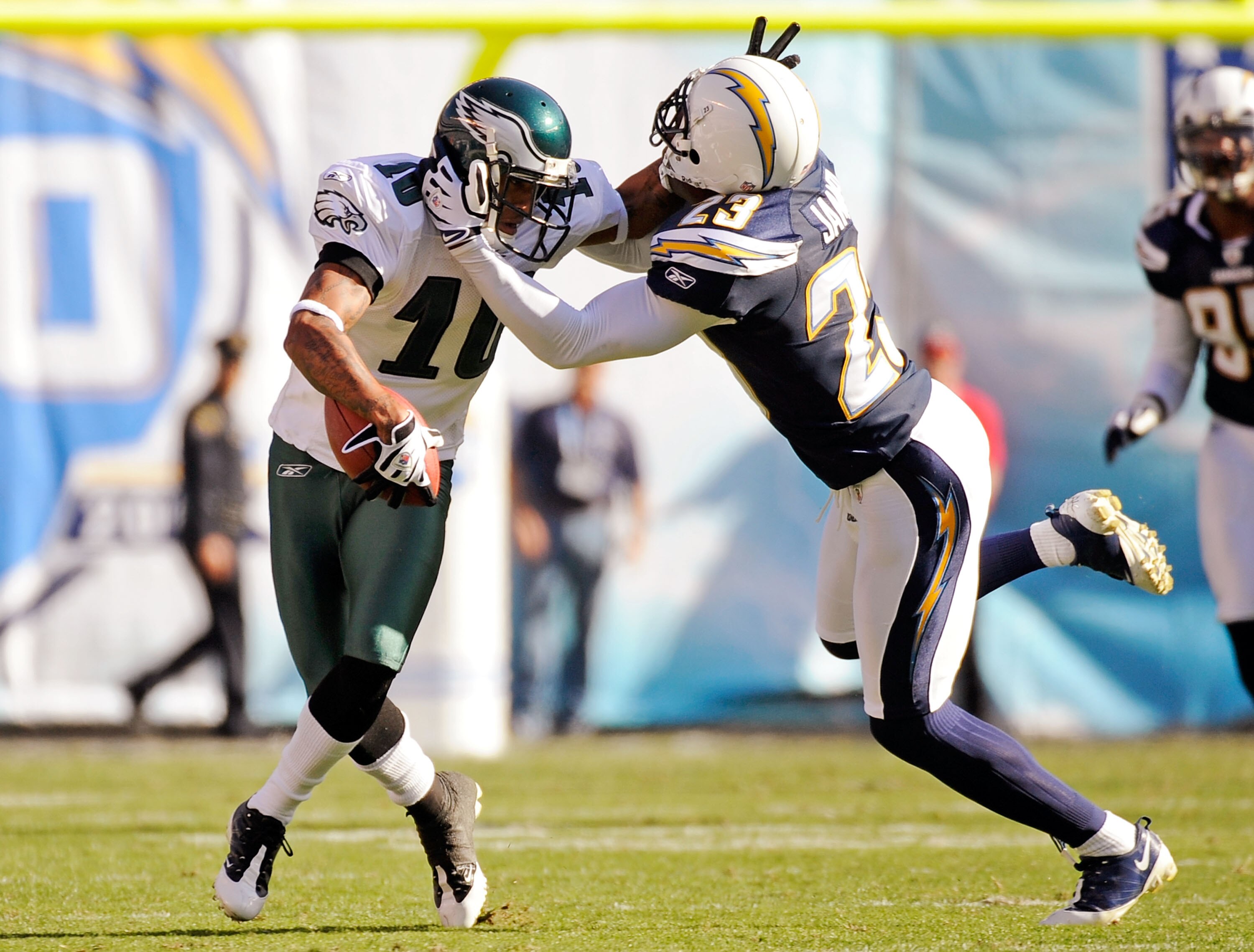 SAN DIEGO - NOVEMBER 15:  DeSean Jackson #10 of the Philadelphia Eagles stiff arms Quentin Jammer #23 of the San Diego Chargers after catching a pass during the NFL football game at Qualcomm Stadium on November 15, 2009 in San Diego, California.  (Photo b