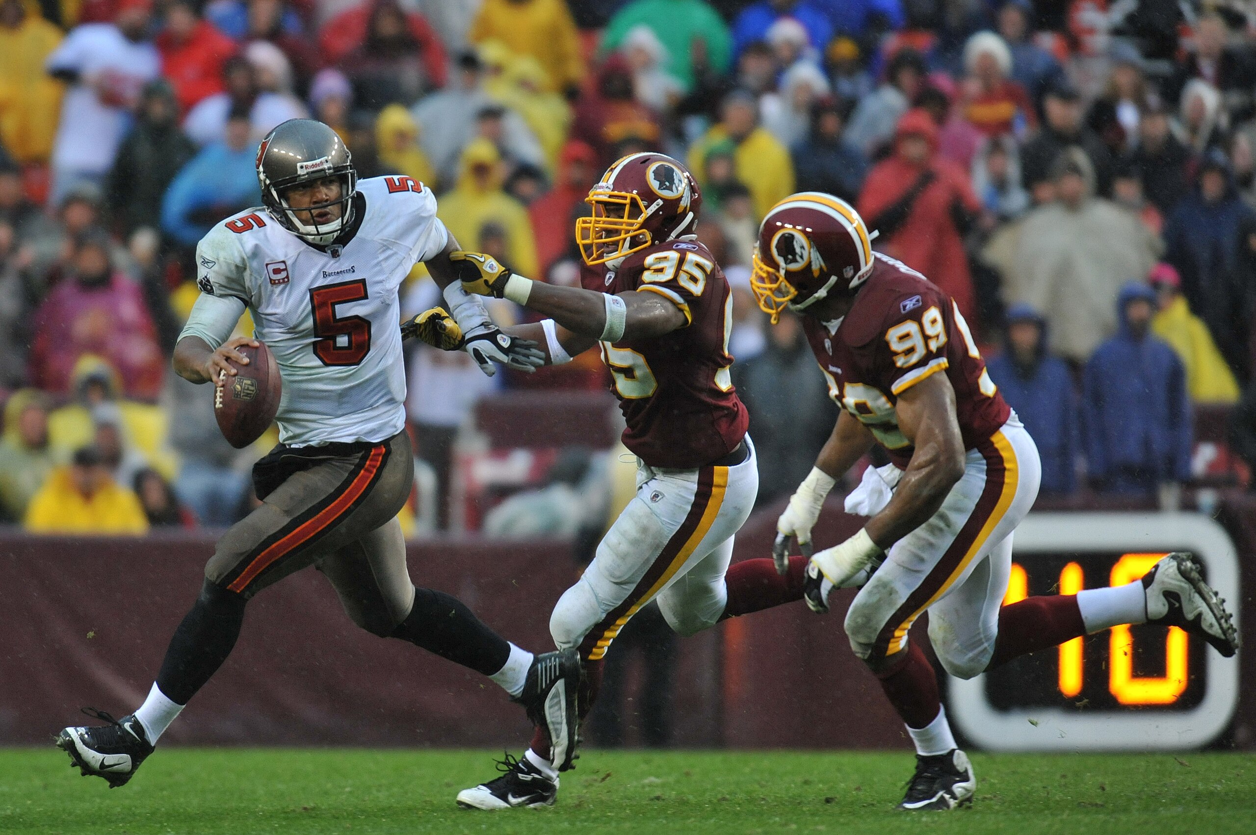 LANDOVER, MD - DECEMBER 12:  Josh Freeman #5 of the Tampa Bay Buccaneers scrambles during the game against the Washington Redskins  at FedExField on December 12, 2010 in Landover, Maryland. The Buccaneers defeated the Redskins 17-16. (Photo by Larry Frenc
