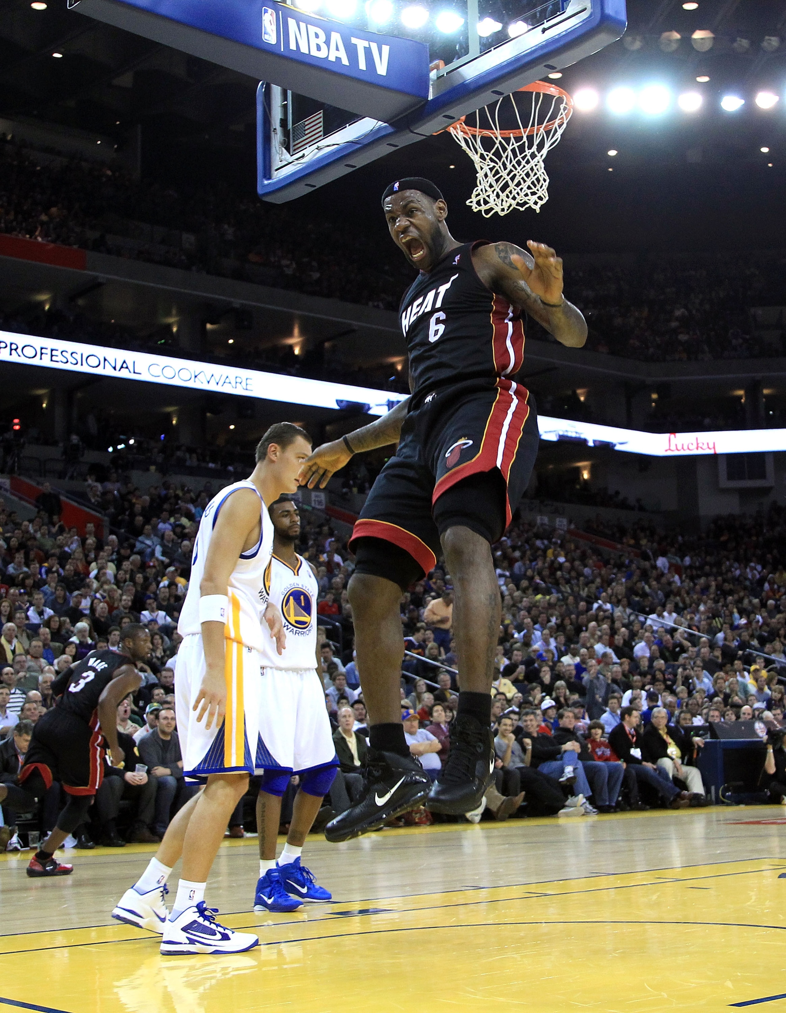 OAKLAND, CA - DECEMBER 10:  Lebron James #6 of the Miami Heat reacts after dunking the ball against the Golden State Warriors at Oracle Arena on December 10, 2010 in Oakland, California. NOTE TO USER: User expressly acknowledges and agrees that, by downlo