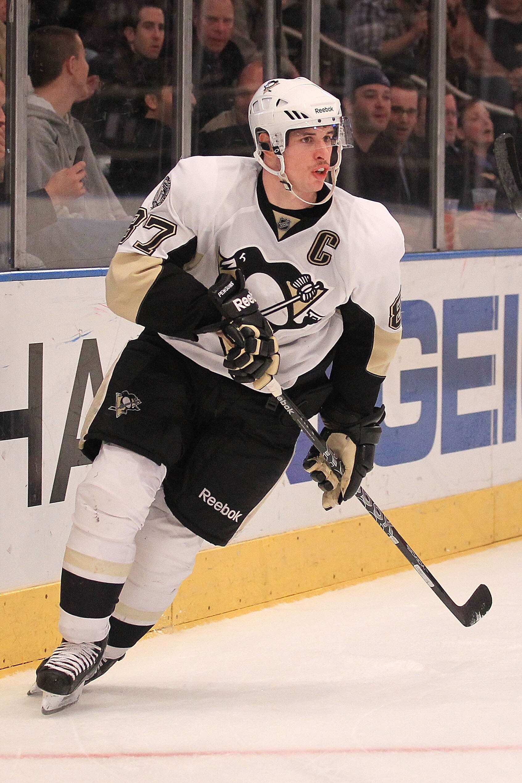 NEW YORK, NY - NOVEMBER 29:  Sidney Crosby #87 of the Pittsburgh Penguins defends against the New York Rangers during their game on November 29, 2010 at Madison Square Garden in New York City.  (Photo by Chris McGrath/Getty Images)