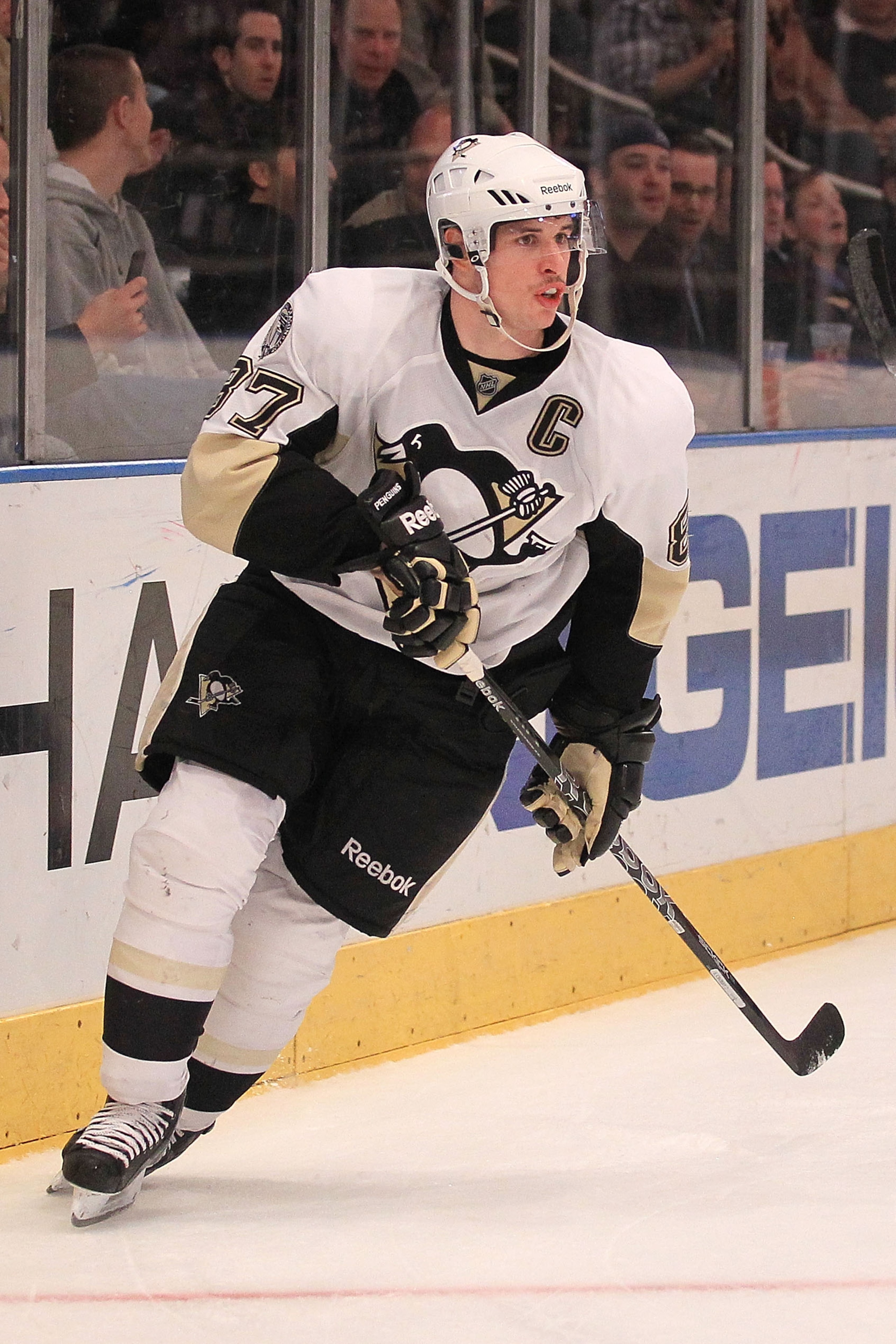 NEW YORK, NY - NOVEMBER 29:  Sidney Crosby #87 of the Pittsburgh Penguins defends against the New York Rangers during their game on November 29, 2010 at Madison Square Garden in New York City.  (Photo by Chris McGrath/Getty Images)