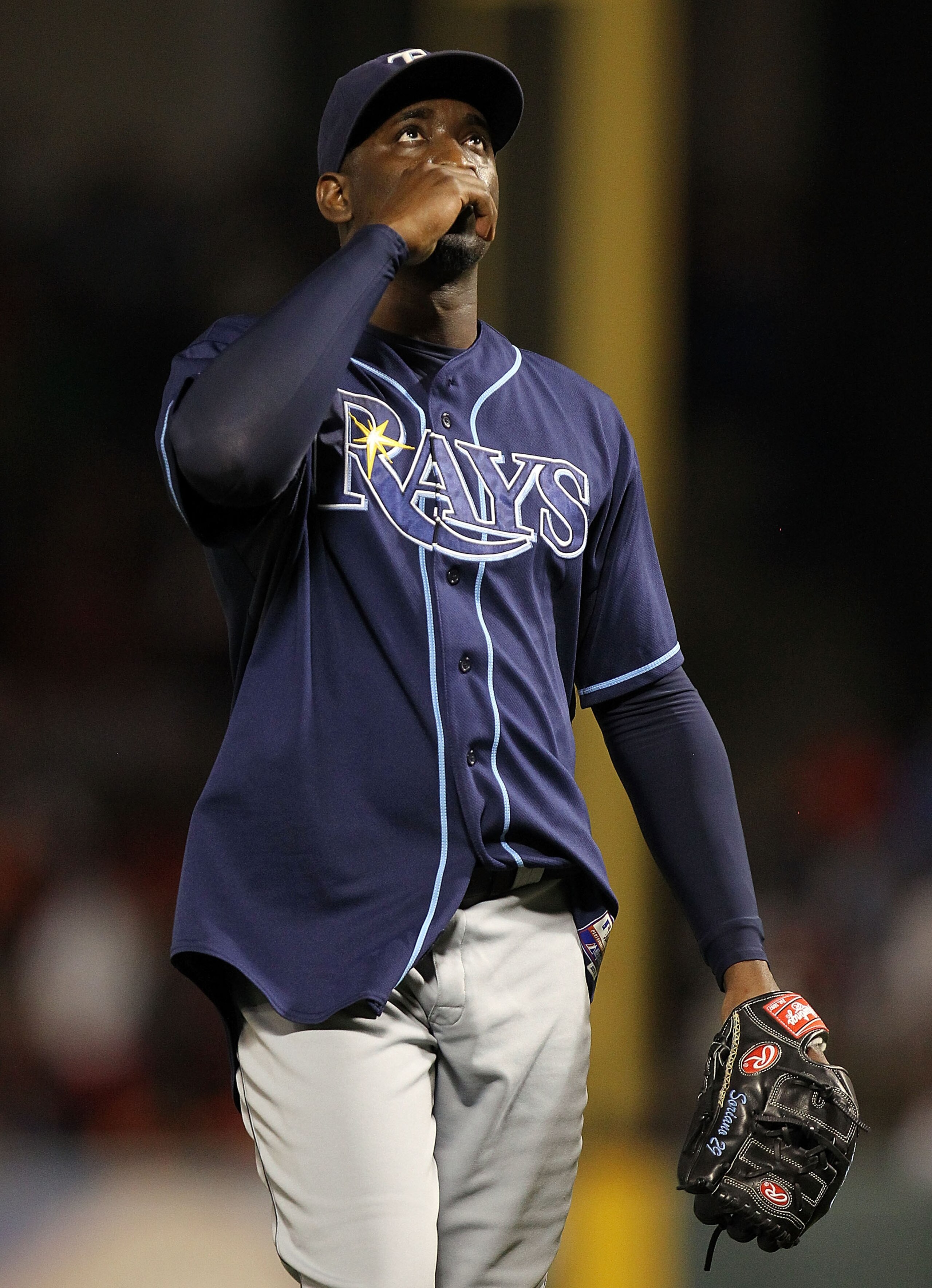 ARLINGTON, TX - OCTOBER 09: Pitcher Rafael Soriano #29 of the Tampa Bay Rays reacts after a 6-3 win against the Texas Rangers during game 3 of the ALDS at Rangers Ballpark in Arlington on October 9, 2010 in Arlington, Texas. (Photo by Ronald Martinez/Ge ARLINGTON, TX - OCTOBER 09: Pitcher Rafael Soriano #29 of the Tampa Bay Rays reacts after a 6-3 win against the Texas Rangers during game 3 of the ALDS at Rangers Ballpark in Arlington on October 9, 2010 in Arlington, Texas. (Photo by Ronald Martinez/Ge