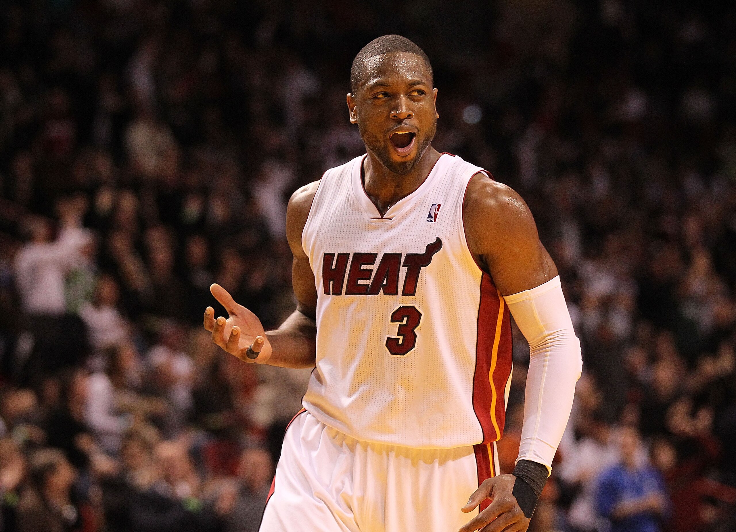 MIAMI, FL - DECEMBER 15: Dwyane Wade #3 of the Miami Heat reacts after making a 3 pointer during a game against the Cleveland Cavaliers at American Airlines Arena on December 15, 2010 in Miami, Florida. NOTE TO USER: User expressly acknowledges and agrees