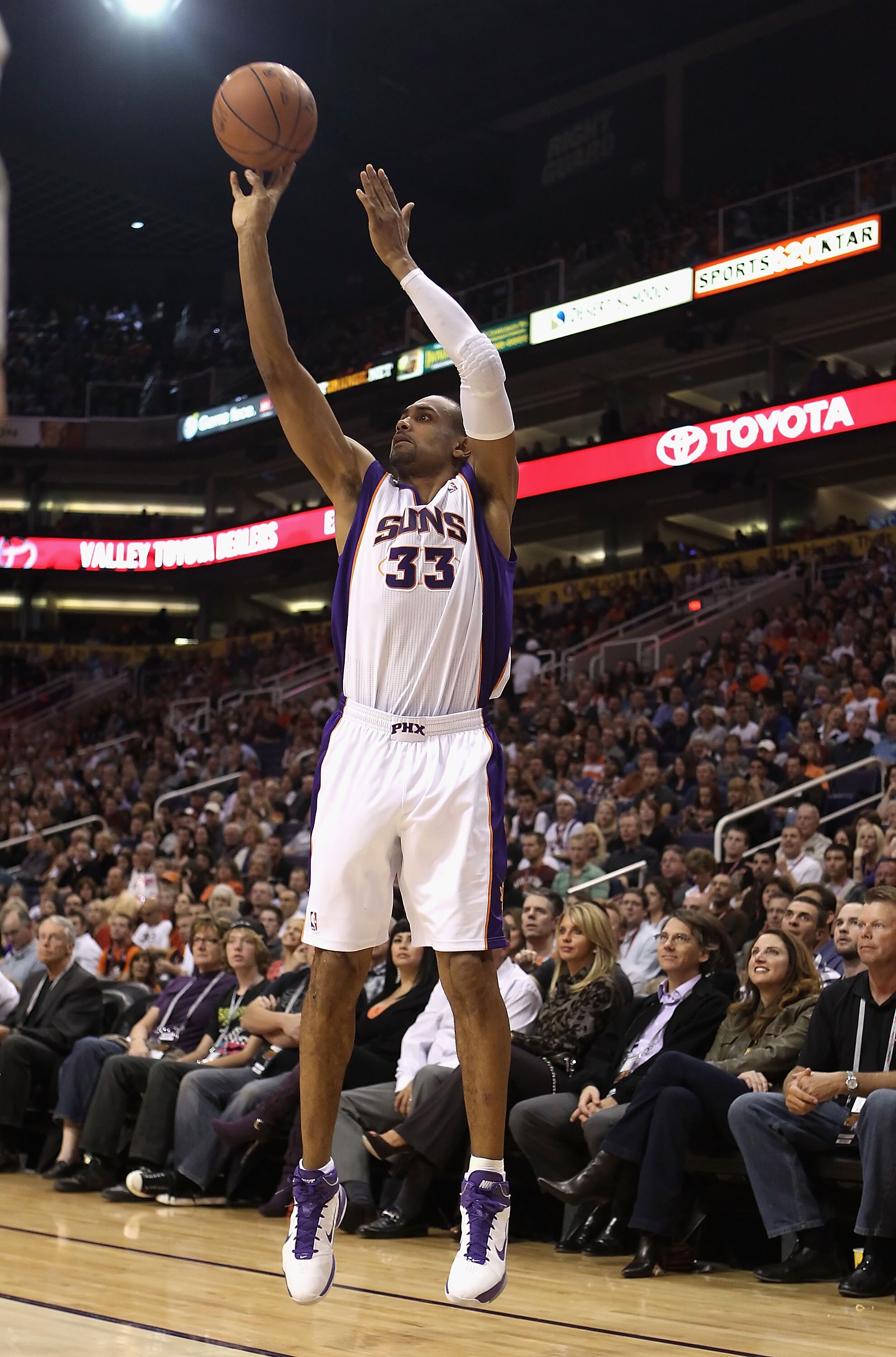 PHOENIX - DECEMBER 10:  Grant Hill #33 of the Phoenix Suns puts up a shot during the NBA game against the Portland Trail Blazers at US Airways Center on December 10, 2010 in Phoenix, Arizona. The Trail Blazers defeated the Suns 101-94.  NOTE TO USER: User