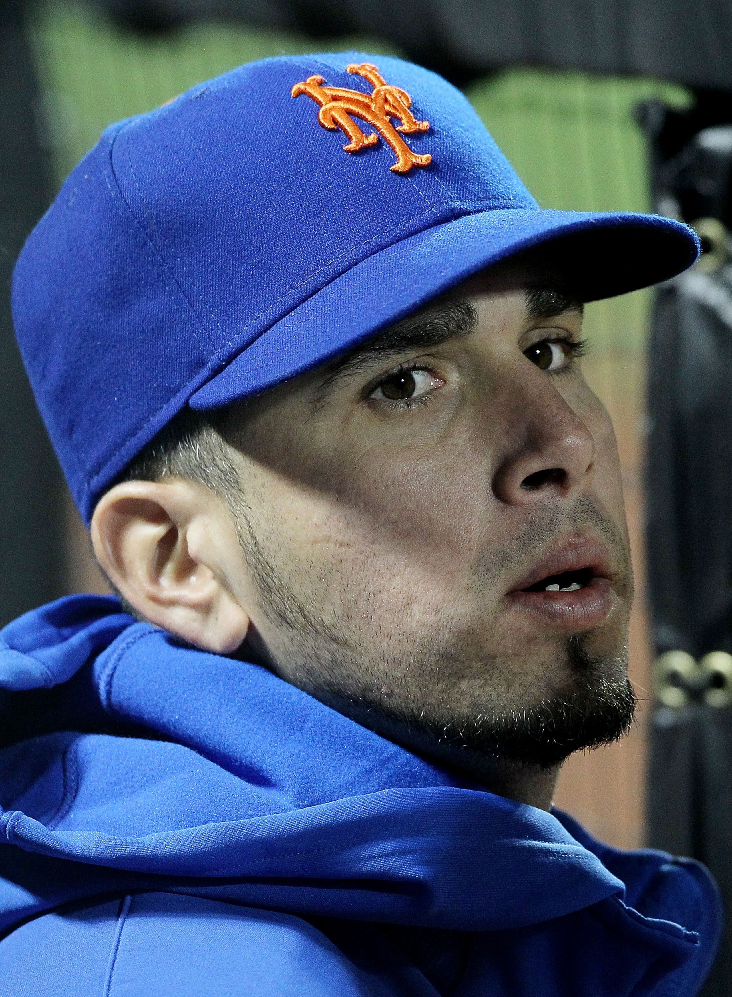 NEW YORK - MAY 10:  Oliver Perez #46 of the New York Mets looks on from the dugout against the Washington Nationals on May 10, 2010 at Citi Field in the Flushing neighborhood of the Queens borough of New York City.  (Photo by Jim McIsaac/Getty Images)