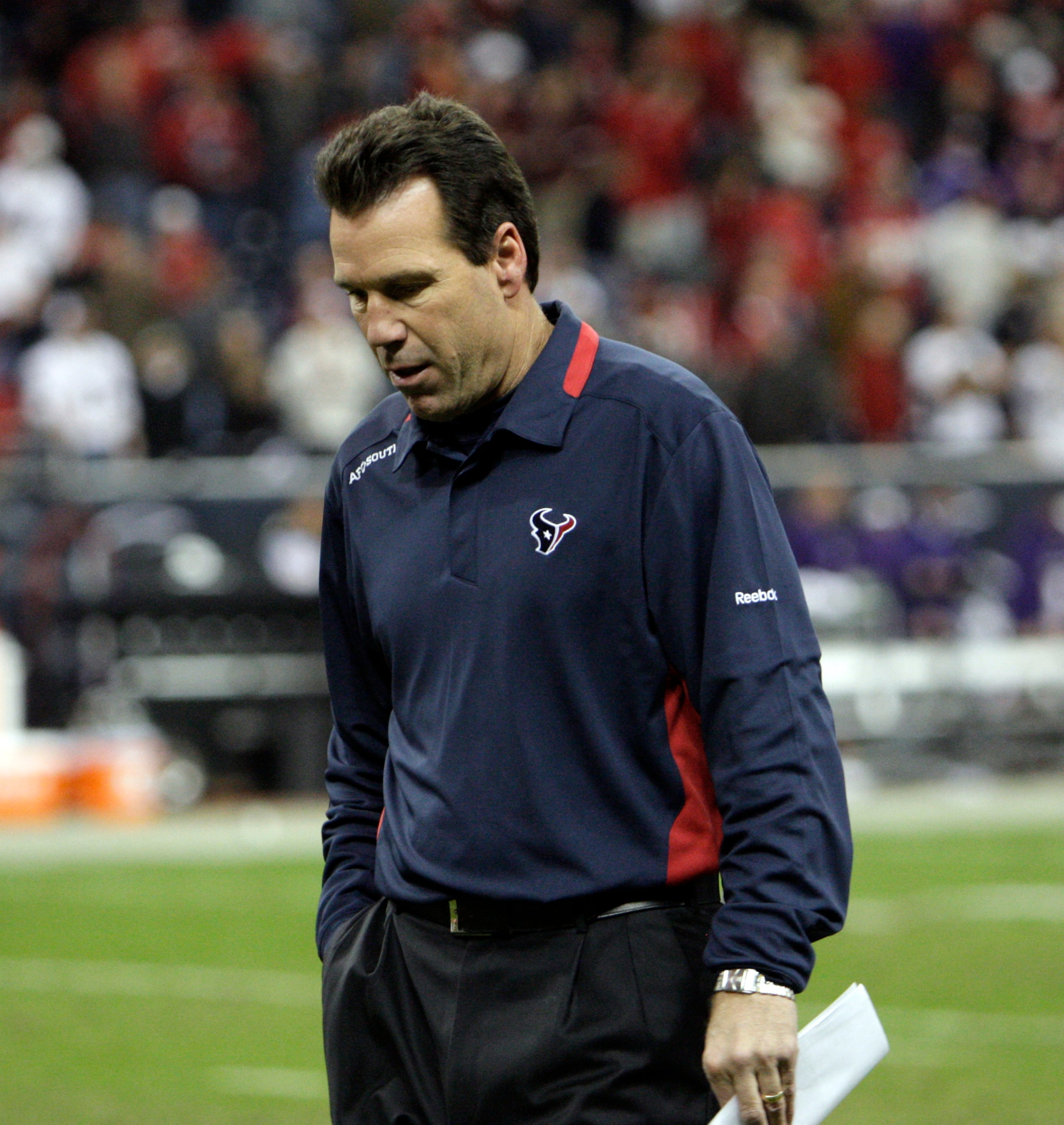 HOUSTON, TX - DECEMBER 13:  Head coach Gary Kubiak of the Houston Texans walks off the field after losing to the Baltimore Ravens in overtime at Reliant Stadium on December 13, 2010 in Houston, Texas.  (Photo by Bob Levey/Getty Images)