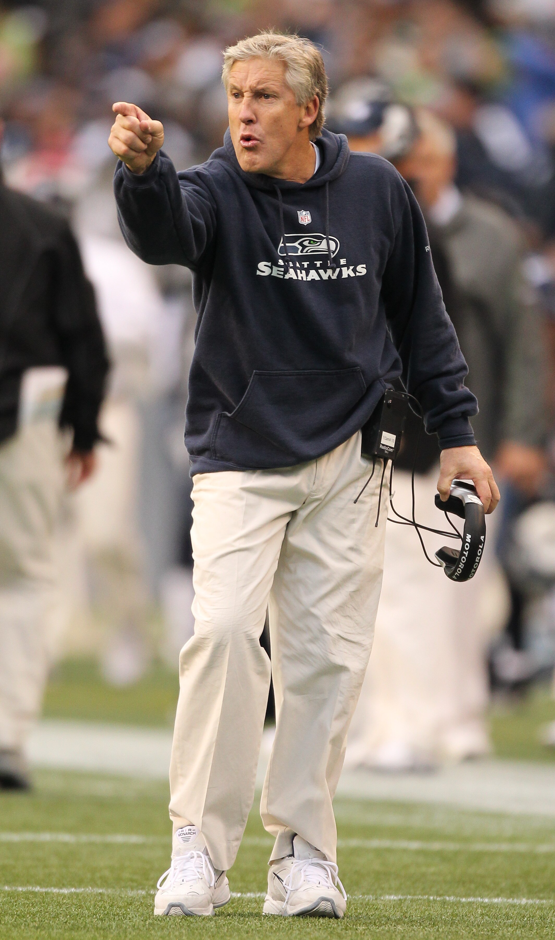 SEATTLE - DECEMBER 05:  Head coach Pete Carroll of the Seattle Seahawks points to the offense after Marshawn Lynch #24 scored a touchdown against the Carolina Panthers at Qwest Field on December 5, 2010 in Seattle, Washington. The Seahawks defeated the Pa