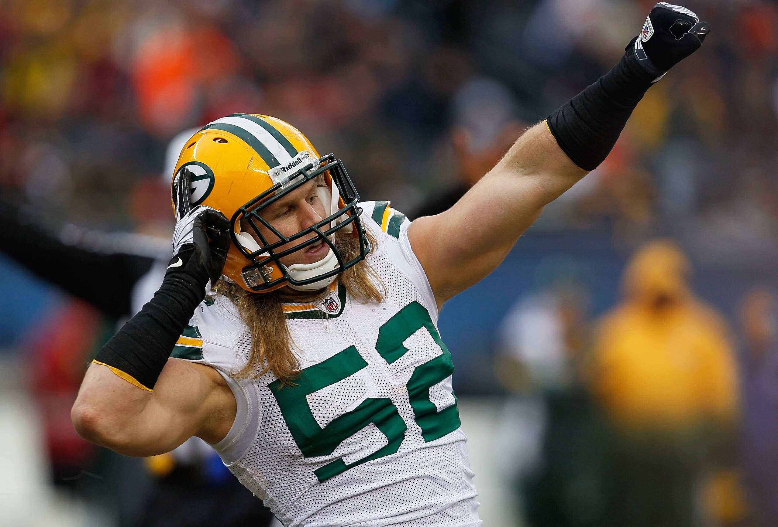 CHICAGO - DECEMBER 13: Clay Matthews #52 of the Green Bay Packers celebrates a sack against Jay Cutler of the Chicago Bears at Soldier Field on December 13, 2009 in Chicago, Illinois. The Packers defeated the Bears 21-14. (Photo by Jonathan Daniel/Getty I