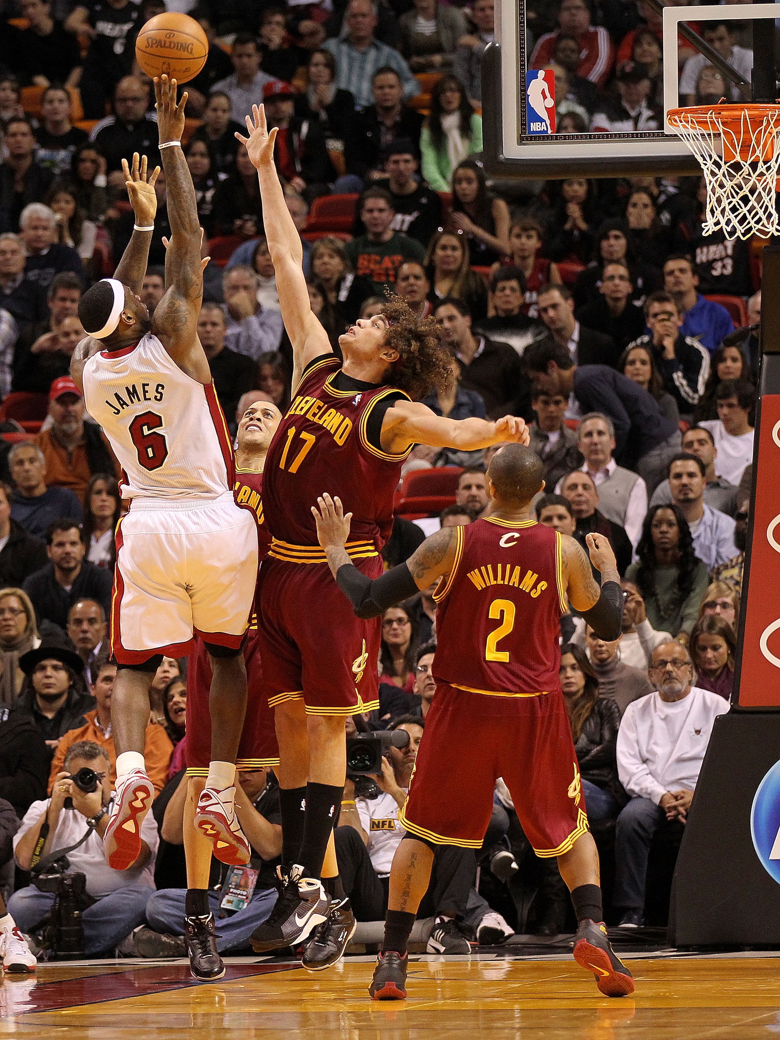 MIAMI, FL - DECEMBER 15:  LeBron James #6 of the Miami Heat shoots over Anderson Varejao #17 of the Cleveland Cavaliers during a game  at American Airlines Arena on December 15, 2010 in Miami, Florida. NOTE TO USER: User expressly acknowledges and agrees